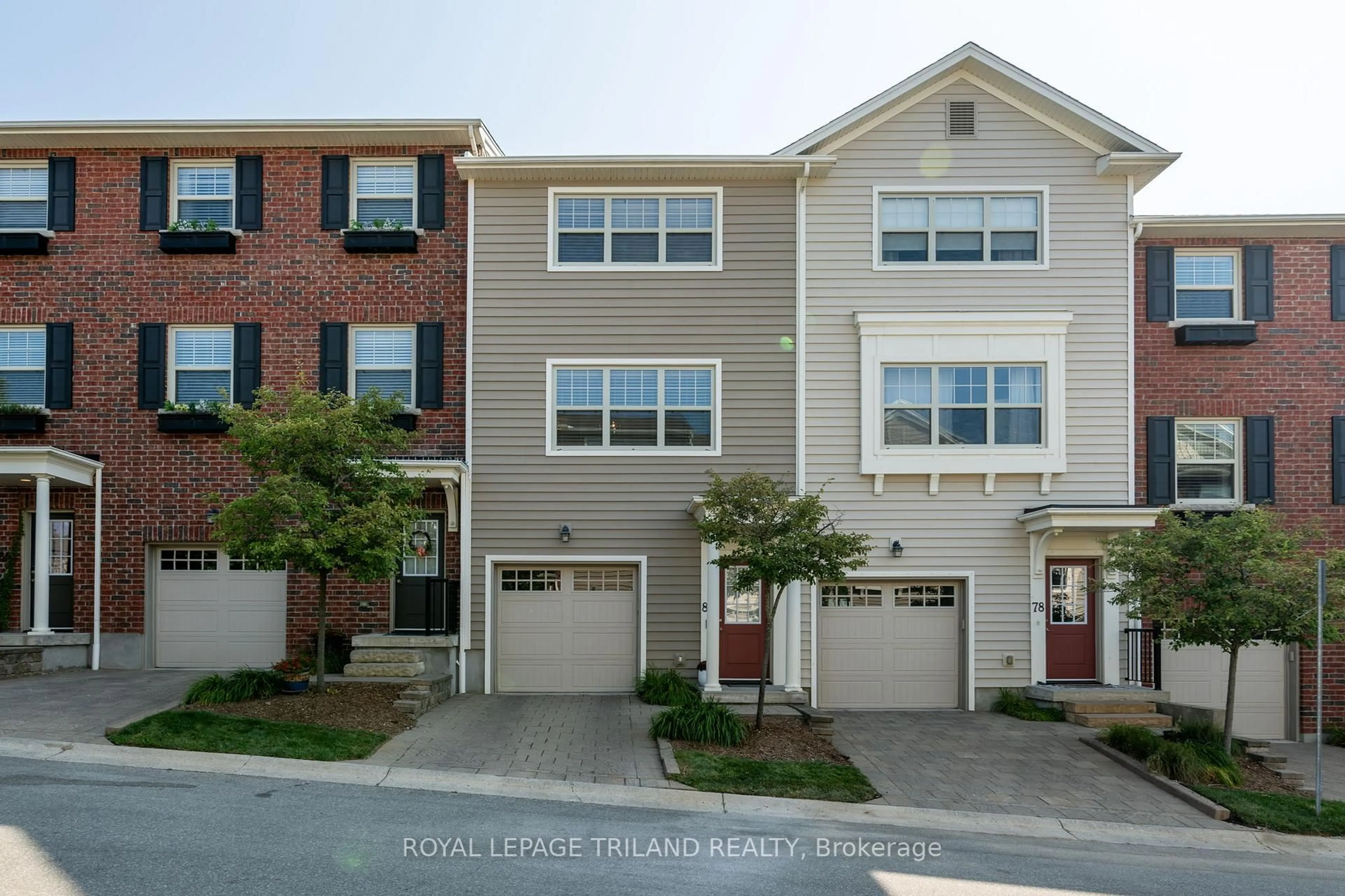 A pic from outside/outdoor area/front of a property/back of a property/a pic from drone, street for 1850 Beaverbrook Ave #80, London North Ontario N6H 0G7