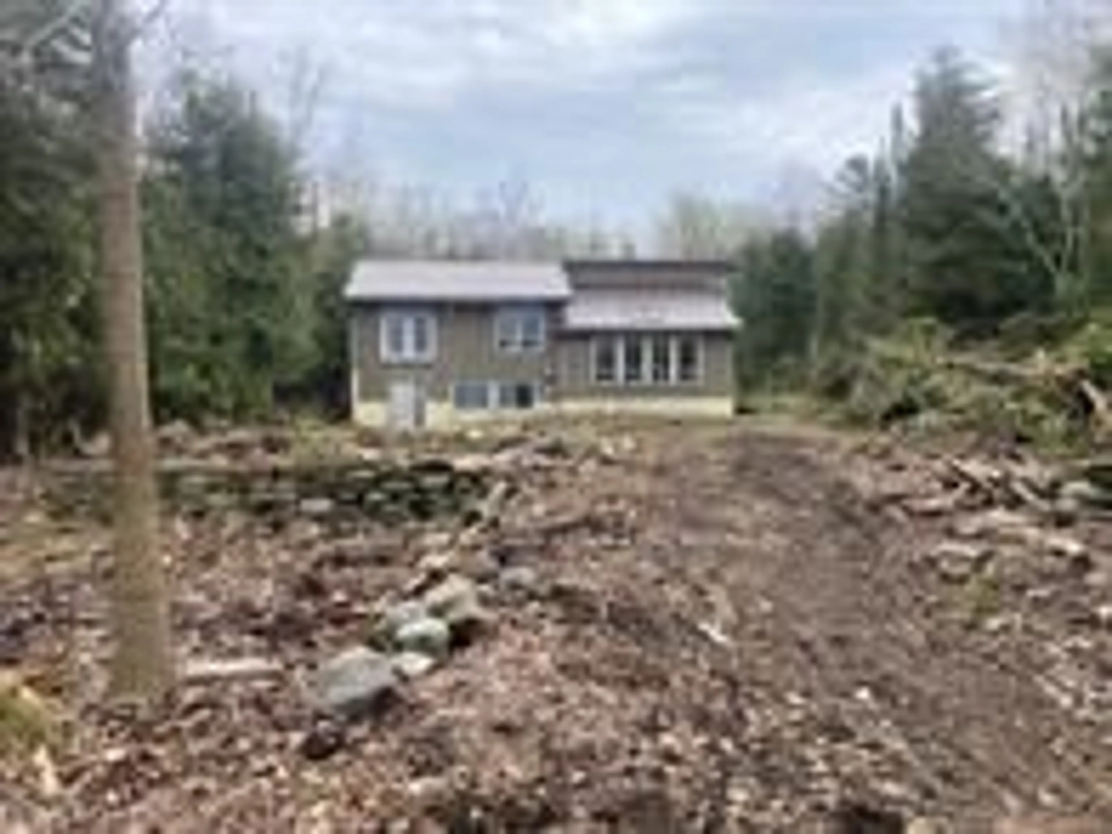 A pic from outside/outdoor area/front of a property/back of a property/a pic from drone, building for 504329 Grey Road 1 Rd, Georgian Bluffs Ontario N0H 2T0