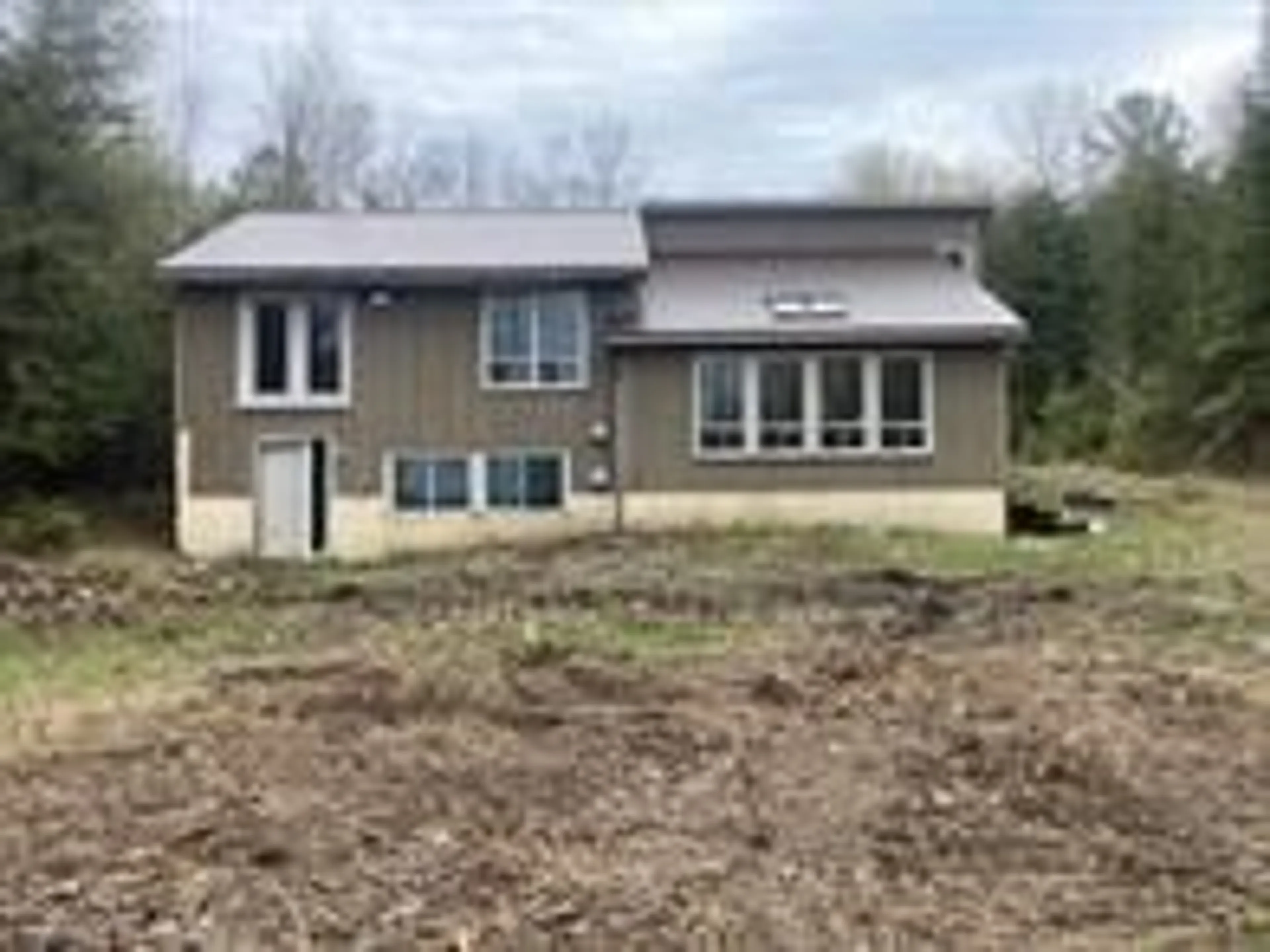 A pic from outside/outdoor area/front of a property/back of a property/a pic from drone, building for 504329 Grey Road 1 Rd, Georgian Bluffs Ontario N0H 2T0