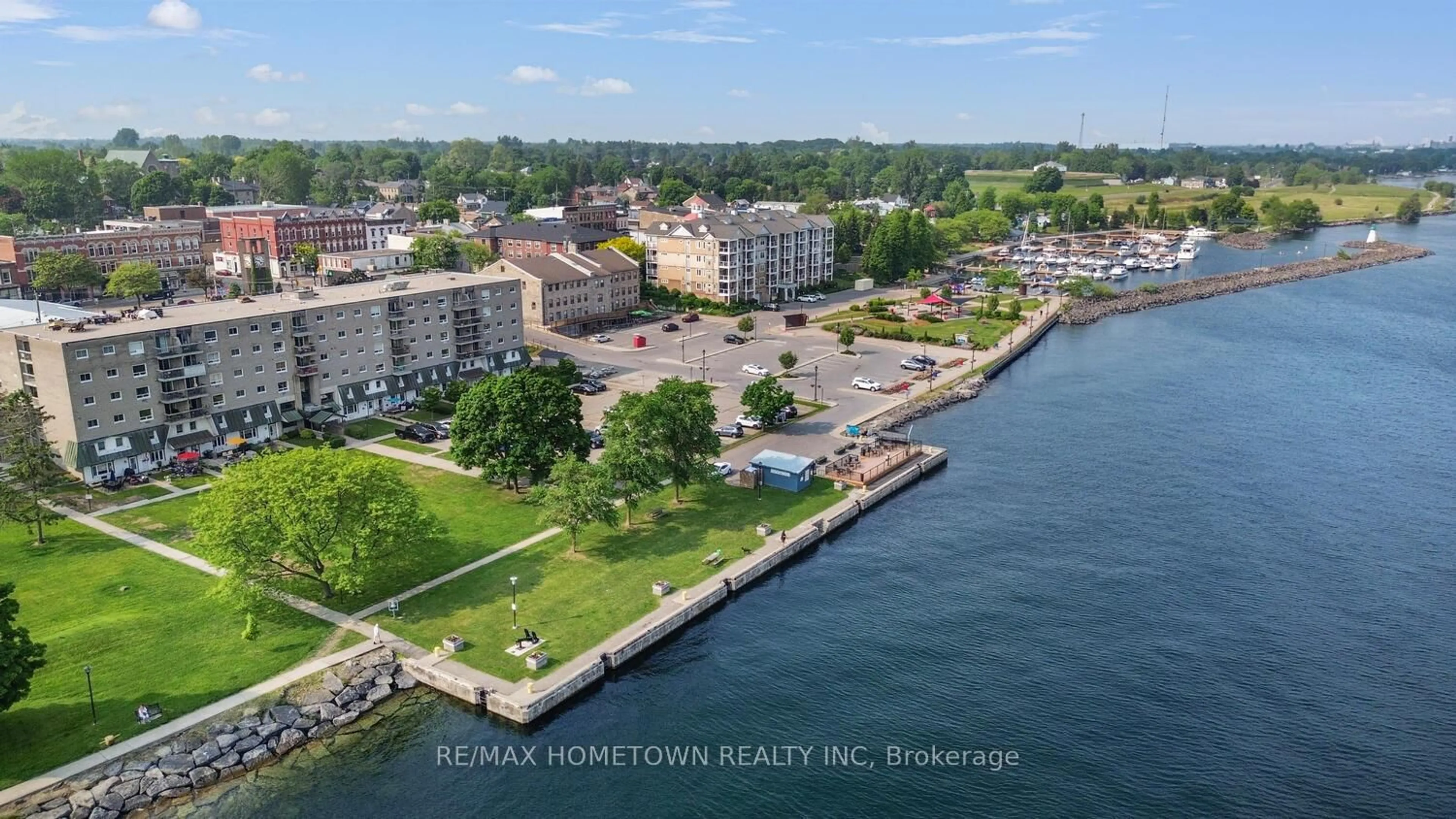 A pic from outside/outdoor area/front of a property/back of a property/a pic from drone, water/lake/river/ocean view for 235 Water St #309, Prescott Ontario K0E 1T0