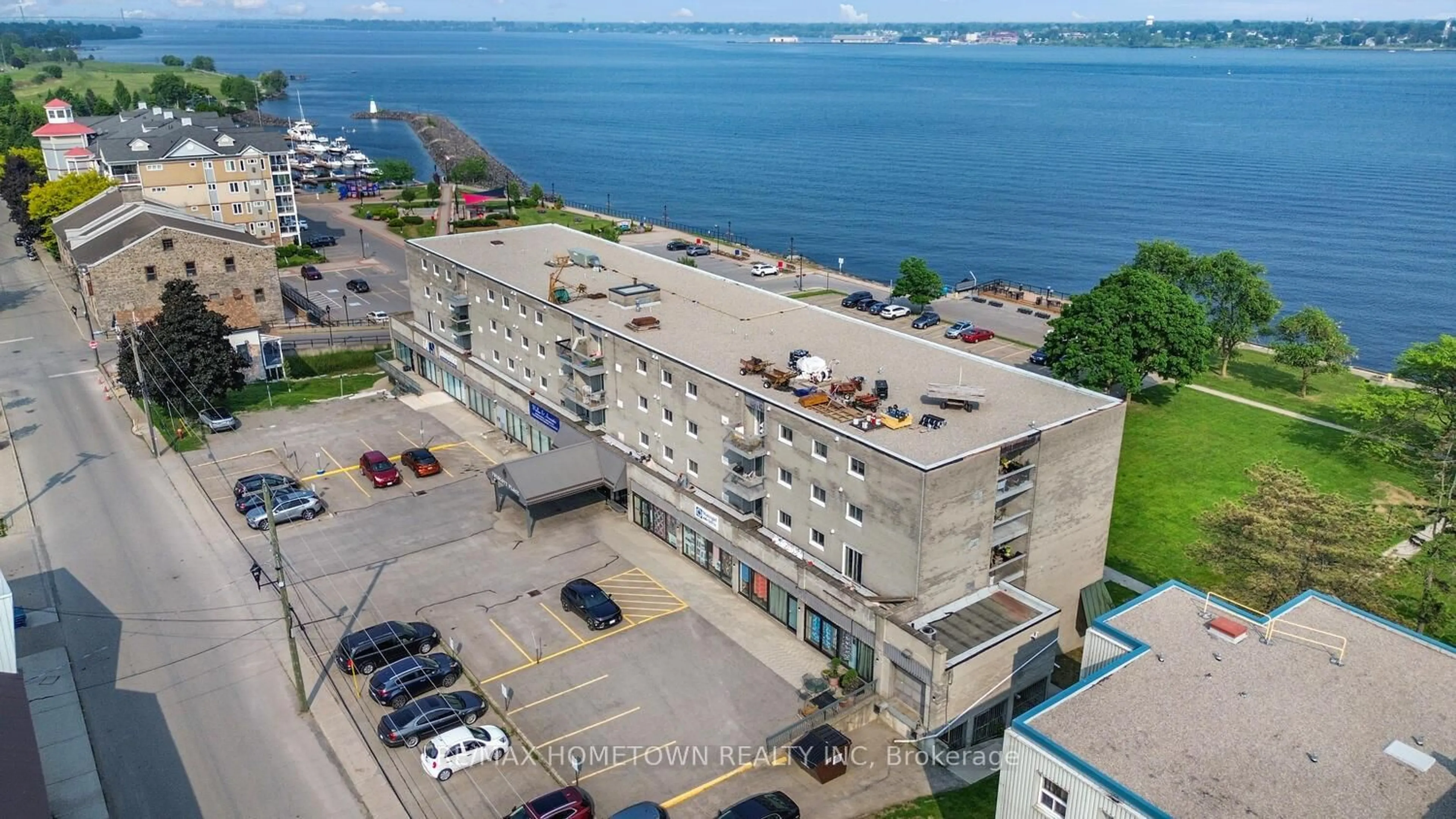 A pic from outside/outdoor area/front of a property/back of a property/a pic from drone, building for 235 Water St #309, Prescott Ontario K0E 1T0