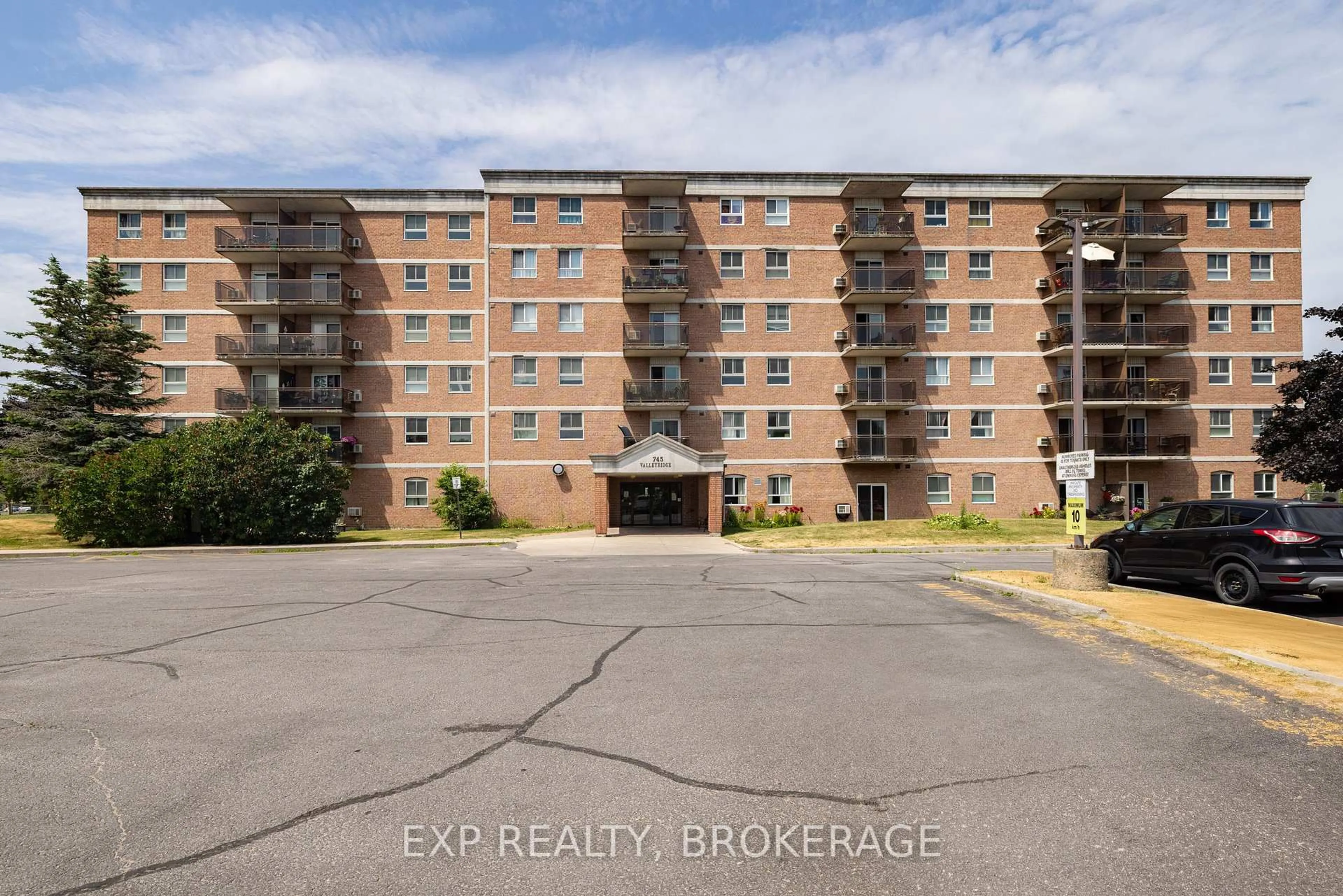 A pic from outside/outdoor area/front of a property/back of a property/a pic from drone, building for 745 Davis Dr #401, Kingston Ontario K7M 8J4