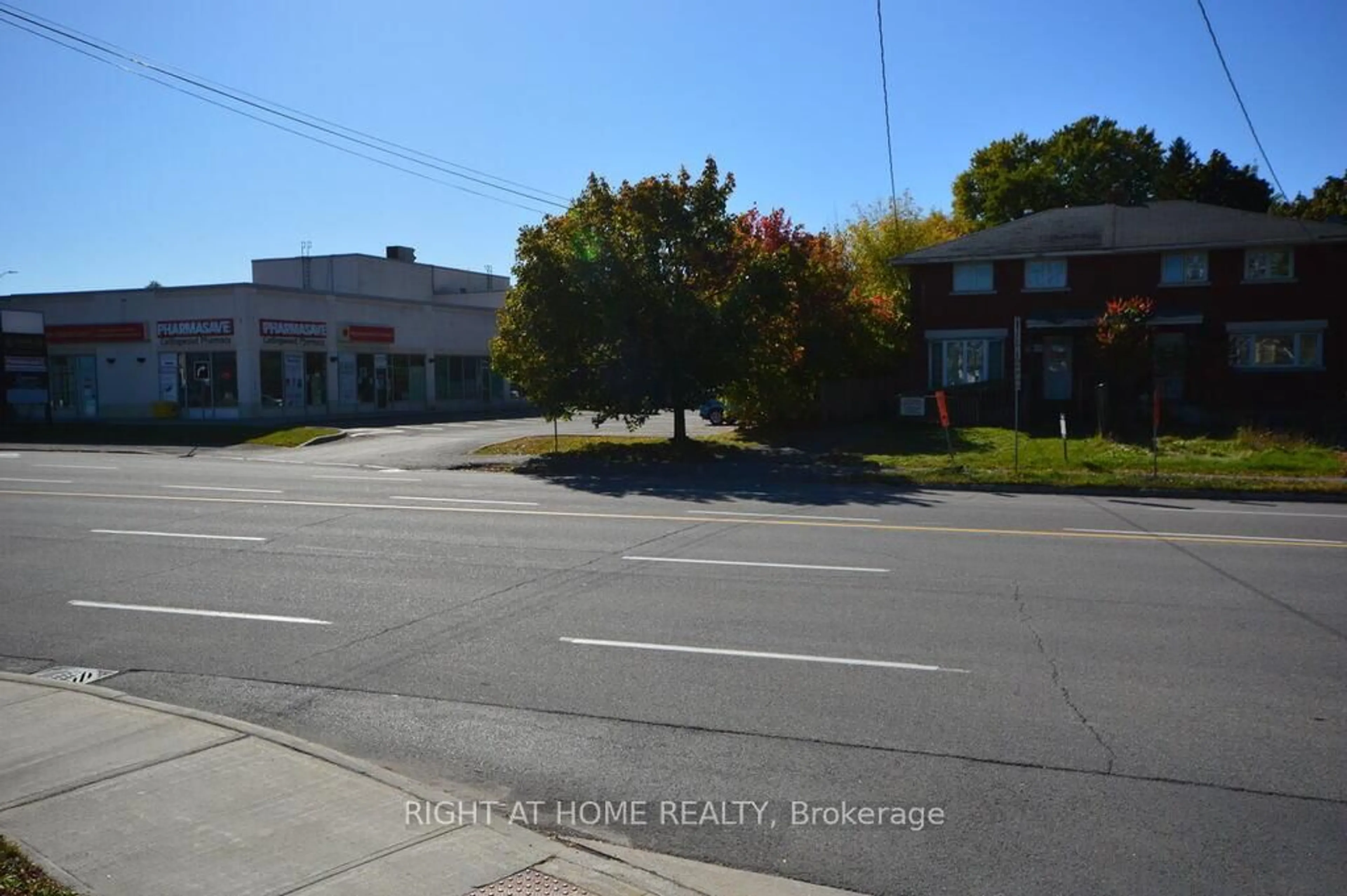 A pic from outside/outdoor area/front of a property/back of a property/a pic from drone, street for 348 Woodroffe Ave, Ottawa Ontario K2A 3V5