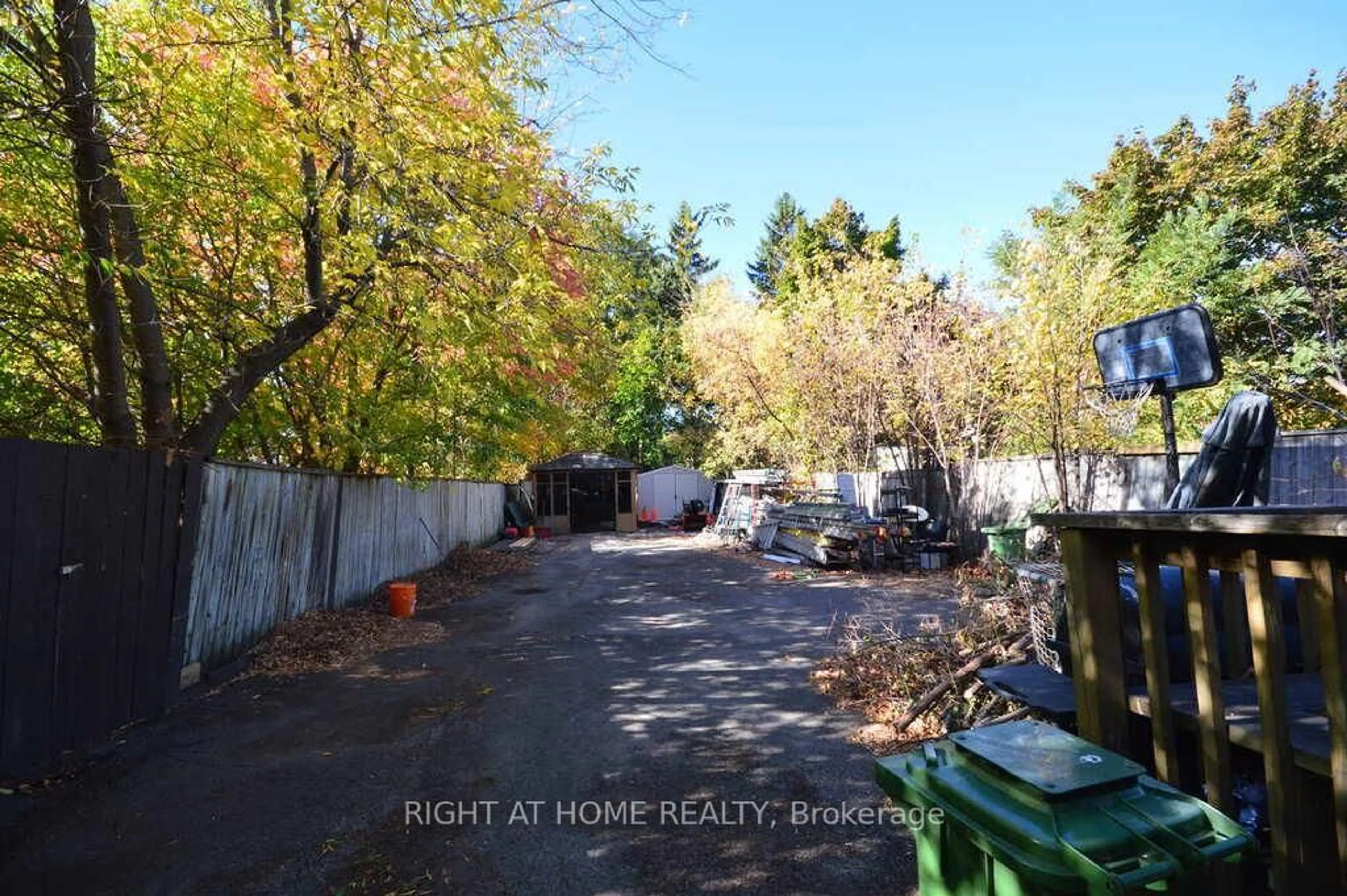 A pic from outside/outdoor area/front of a property/back of a property/a pic from drone, forest/trees view for 348 Woodroffe Ave, Ottawa Ontario K2A 3V5