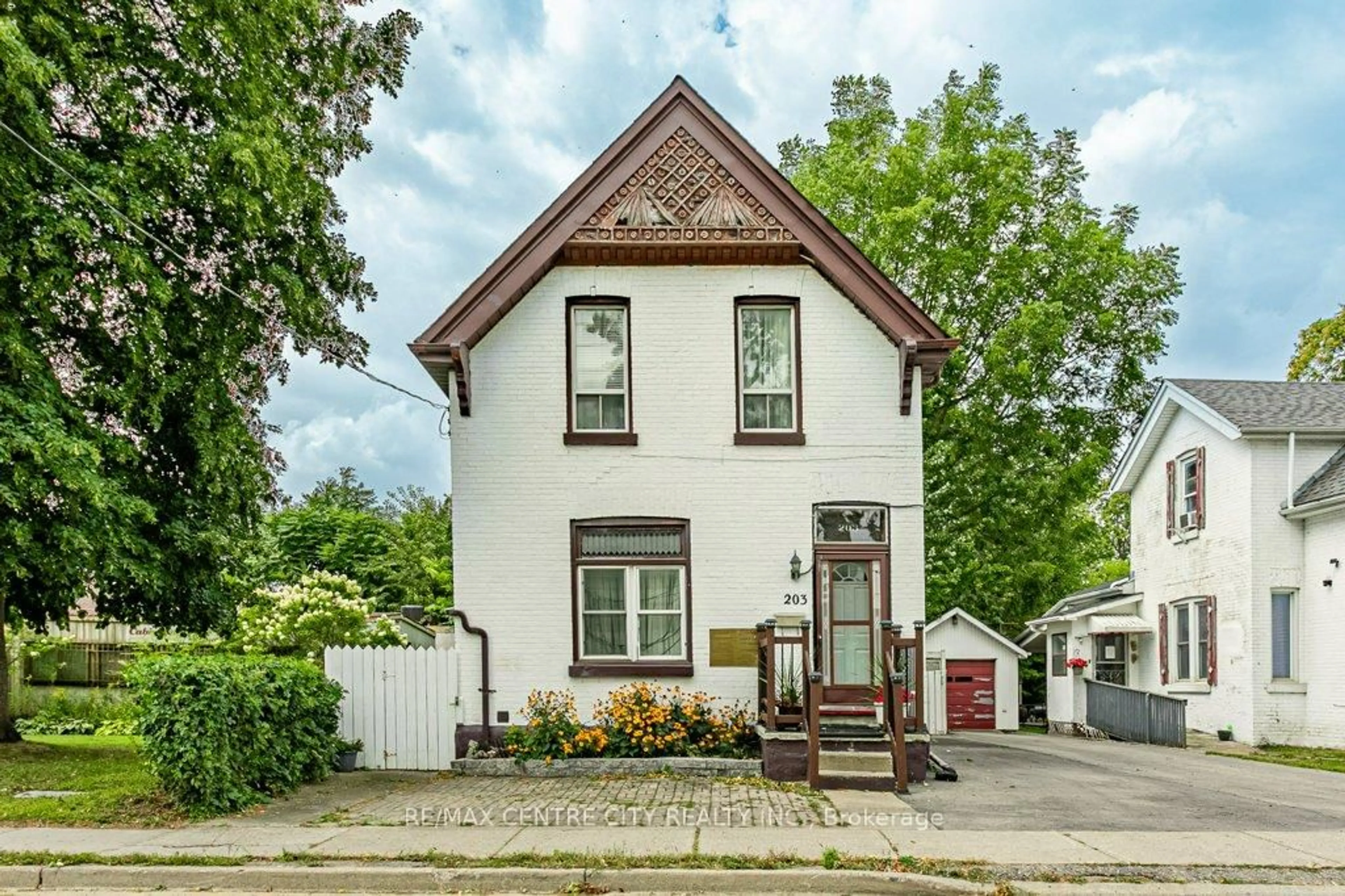 Home with brick exterior material, street for 203 Rectory St, London East Ontario N5Z 2A6