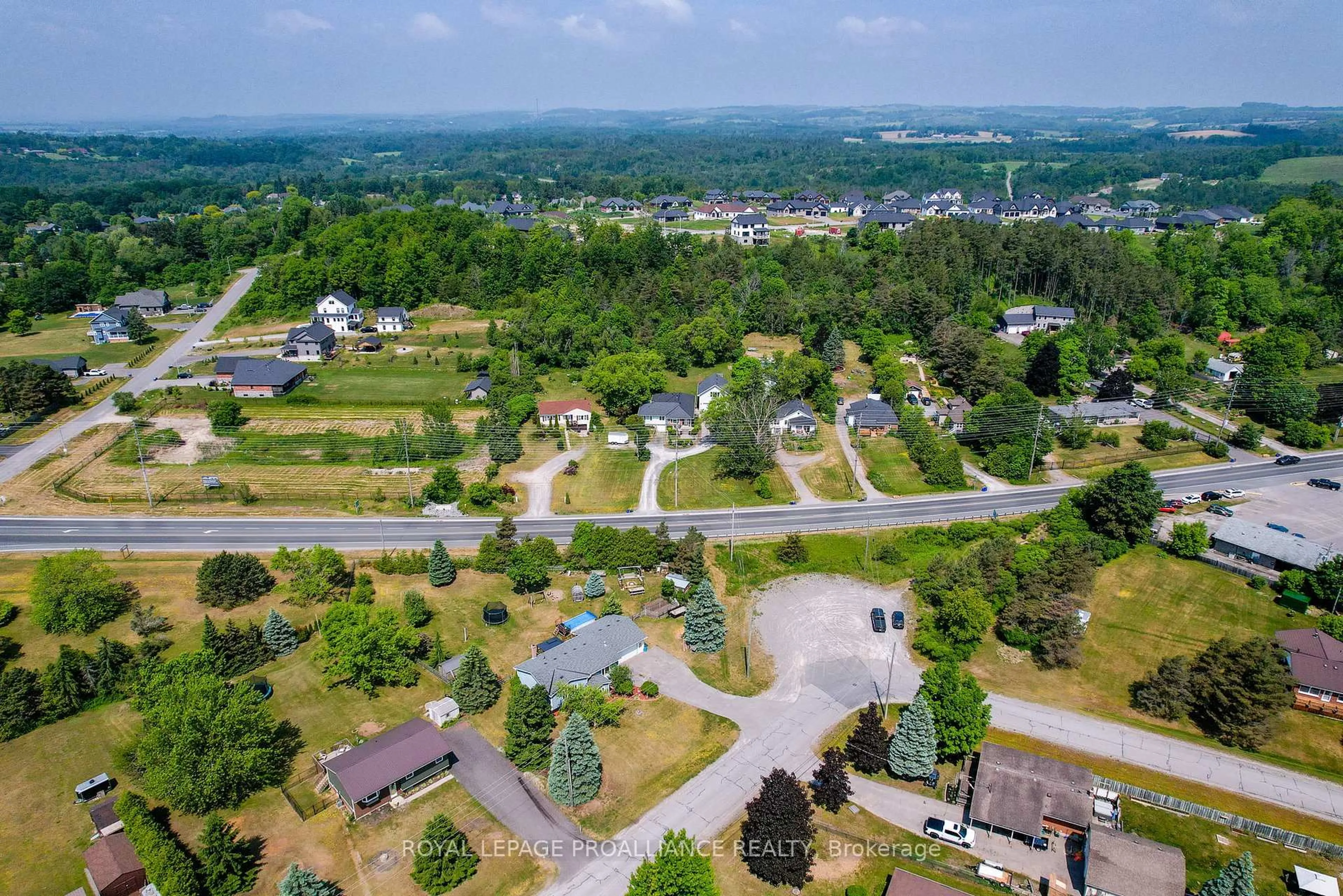 A pic from outside/outdoor area/front of a property/back of a property/a pic from drone, mountain view for 8 Oriole Cres, Hamilton Township Ontario K0K 1C0