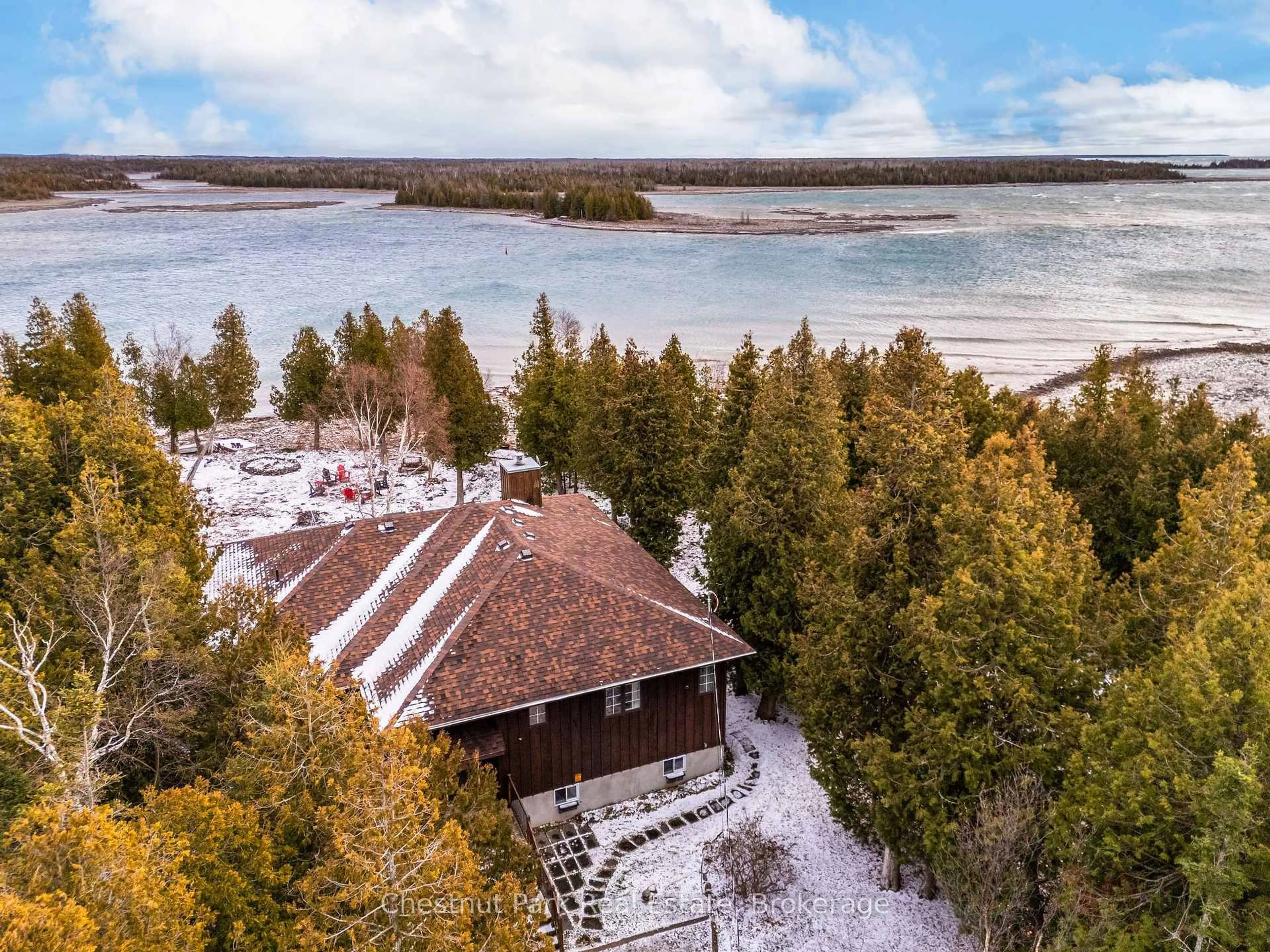 A pic from outside/outdoor area/front of a property/back of a property/a pic from drone, water/lake/river/ocean view for 137 Pine Tree Harbour Rd, Northern Bruce Peninsula Ontario N0H 1Z0