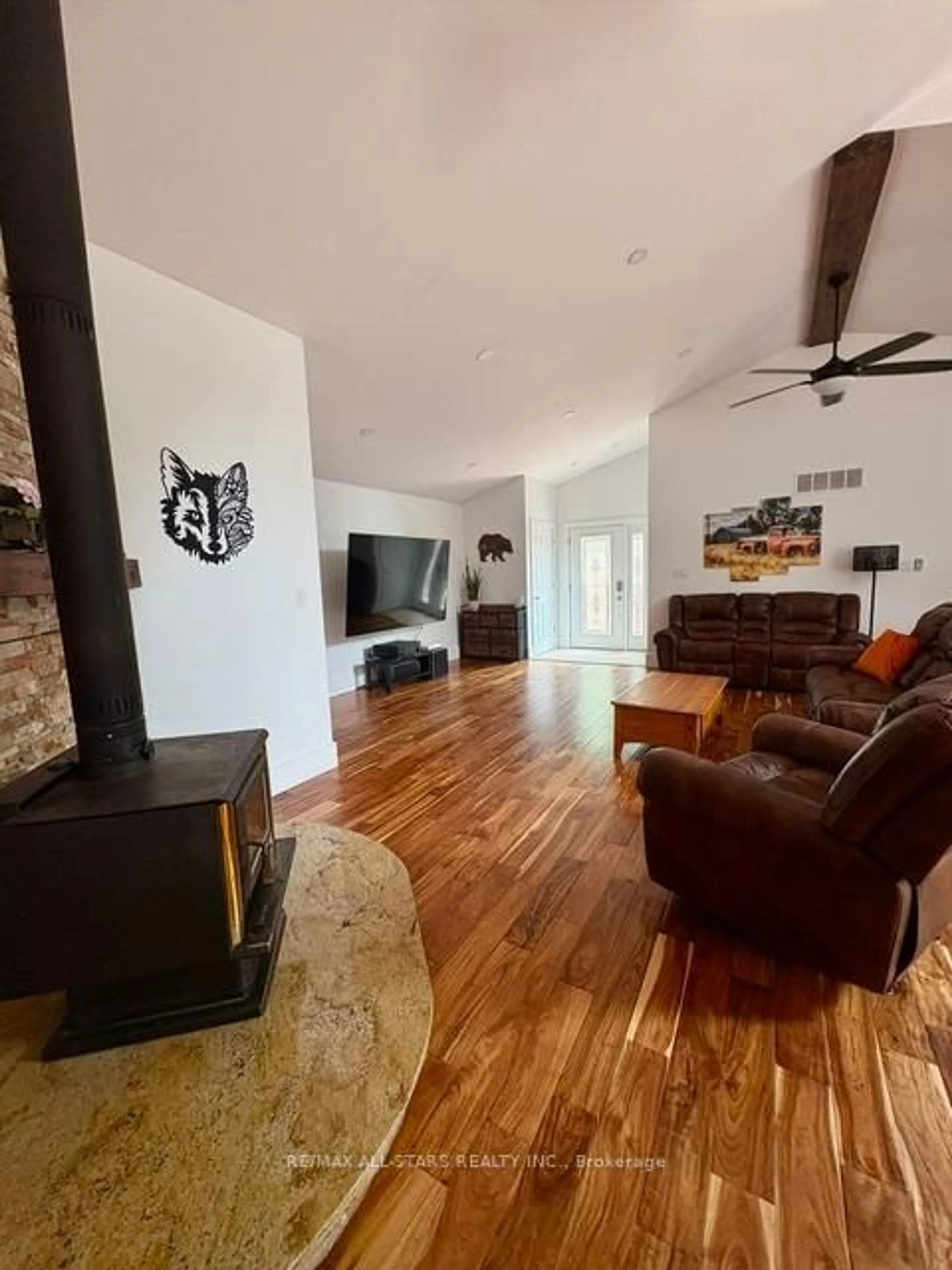 Living room with furniture, wood/laminate floor for 728 Galway Rd, Trent Lakes Ontario K0M 2A0