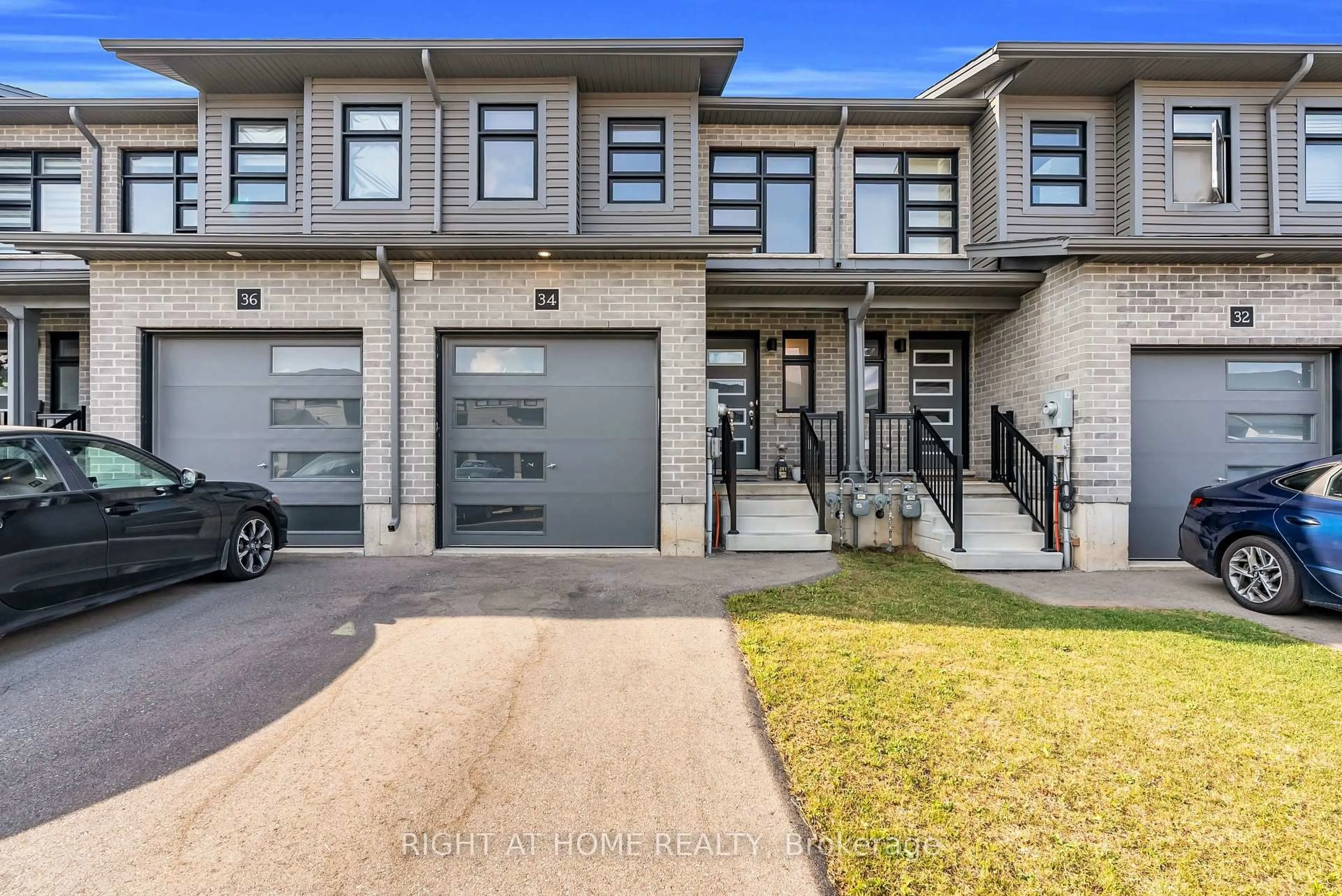 Home with brick exterior material, street for 34 Wilkinson Ave, Cambridge Ontario N1S 0E2