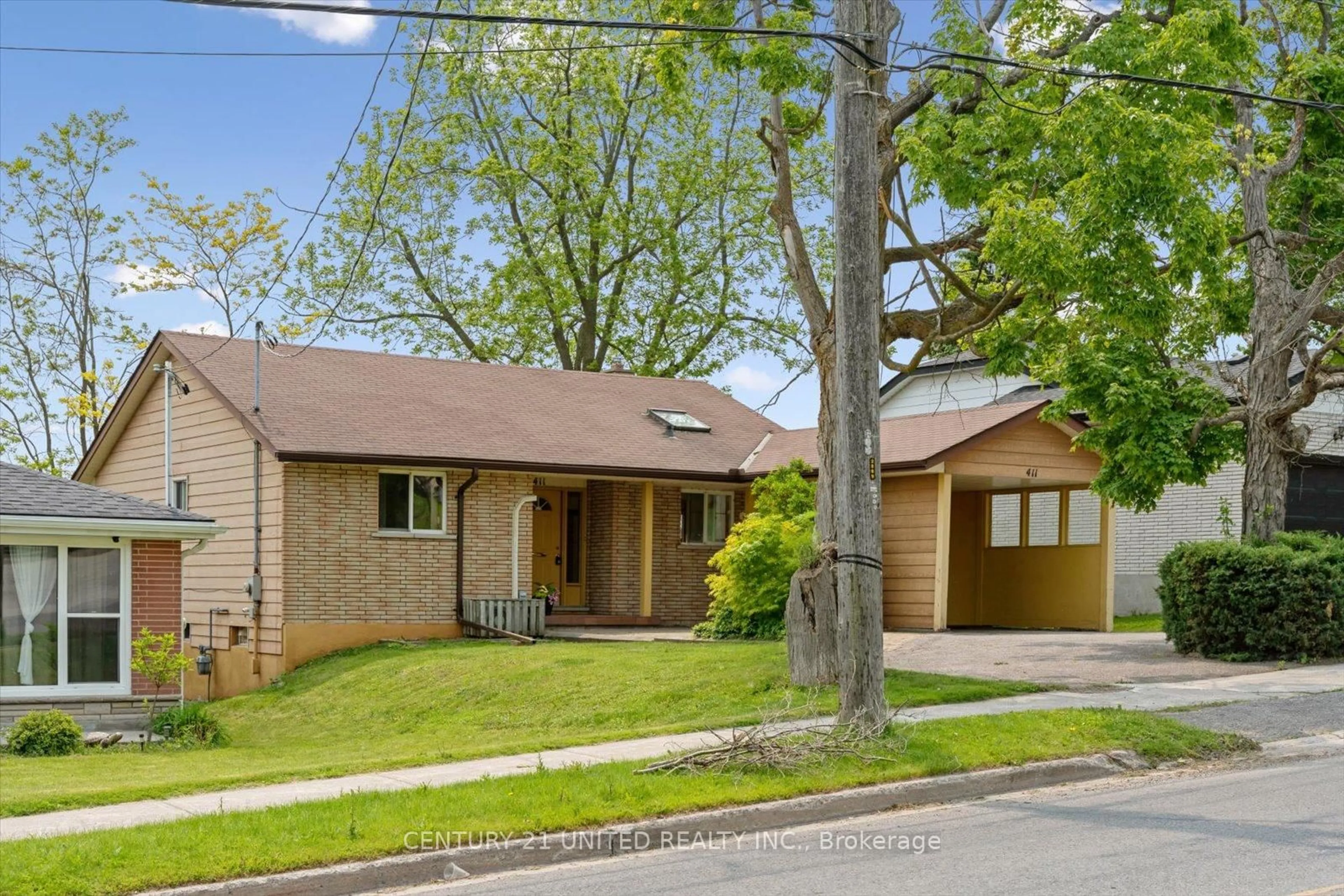 Home with brick exterior material, street for 411 Highland Rd, Peterborough Ontario K9H 5J6