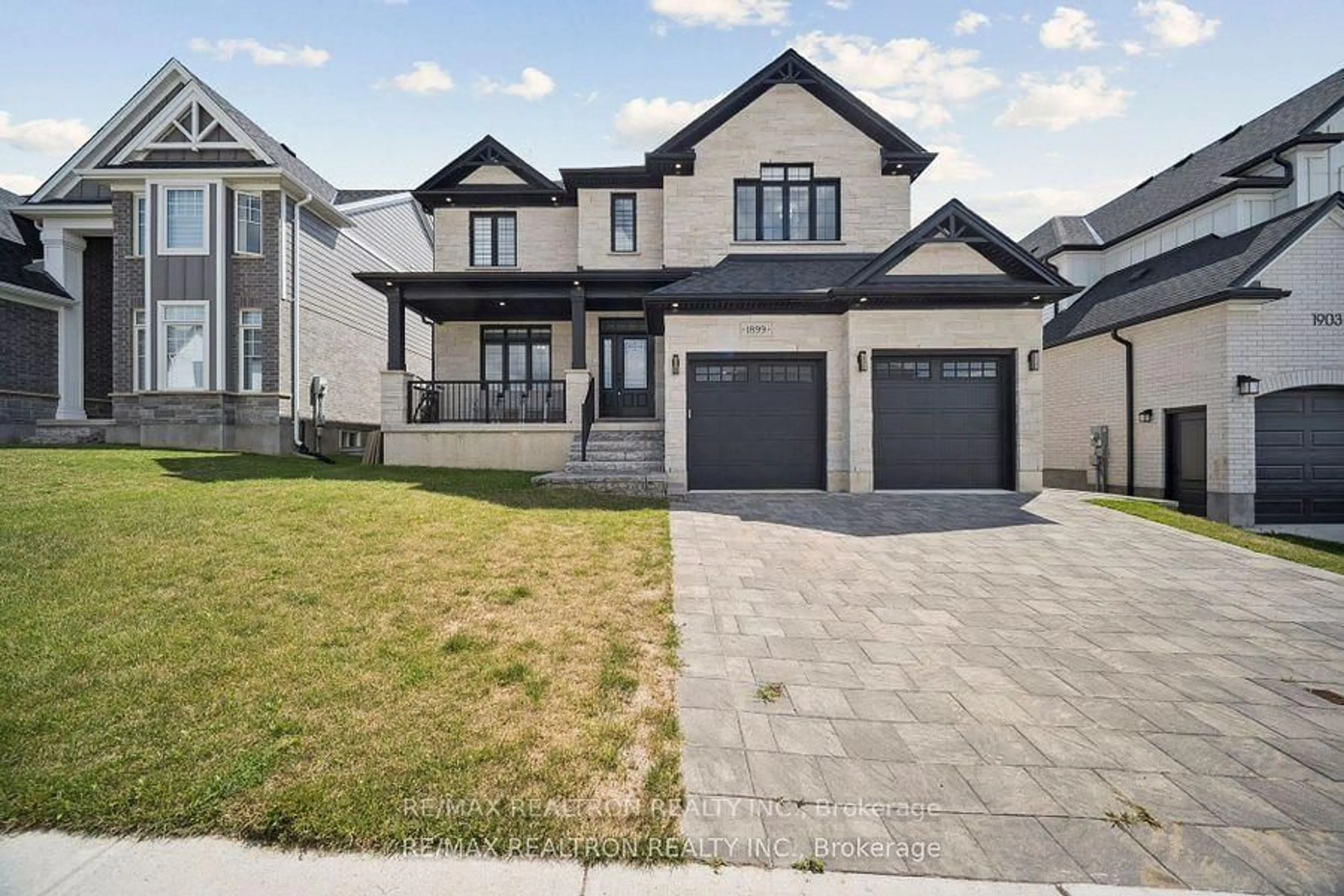Home with brick exterior material, street for 1899 Boardwalk Way, London South Ontario N6K 0A5