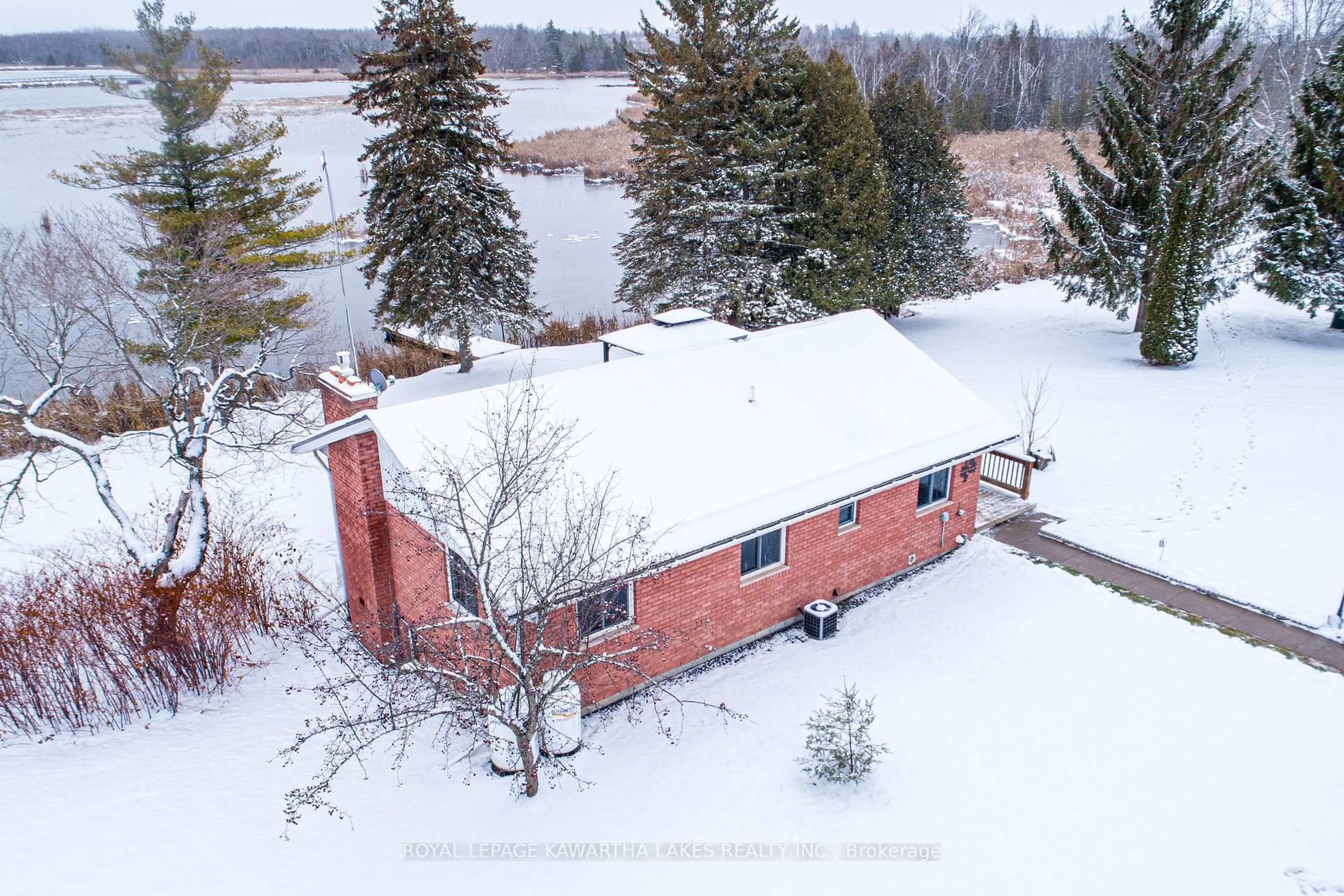 A pic from outside/outdoor area/front of a property/back of a property/a pic from drone, water/lake/river/ocean view for 1 Bridle Rd, Kawartha Lakes Ontario K9V 4R2