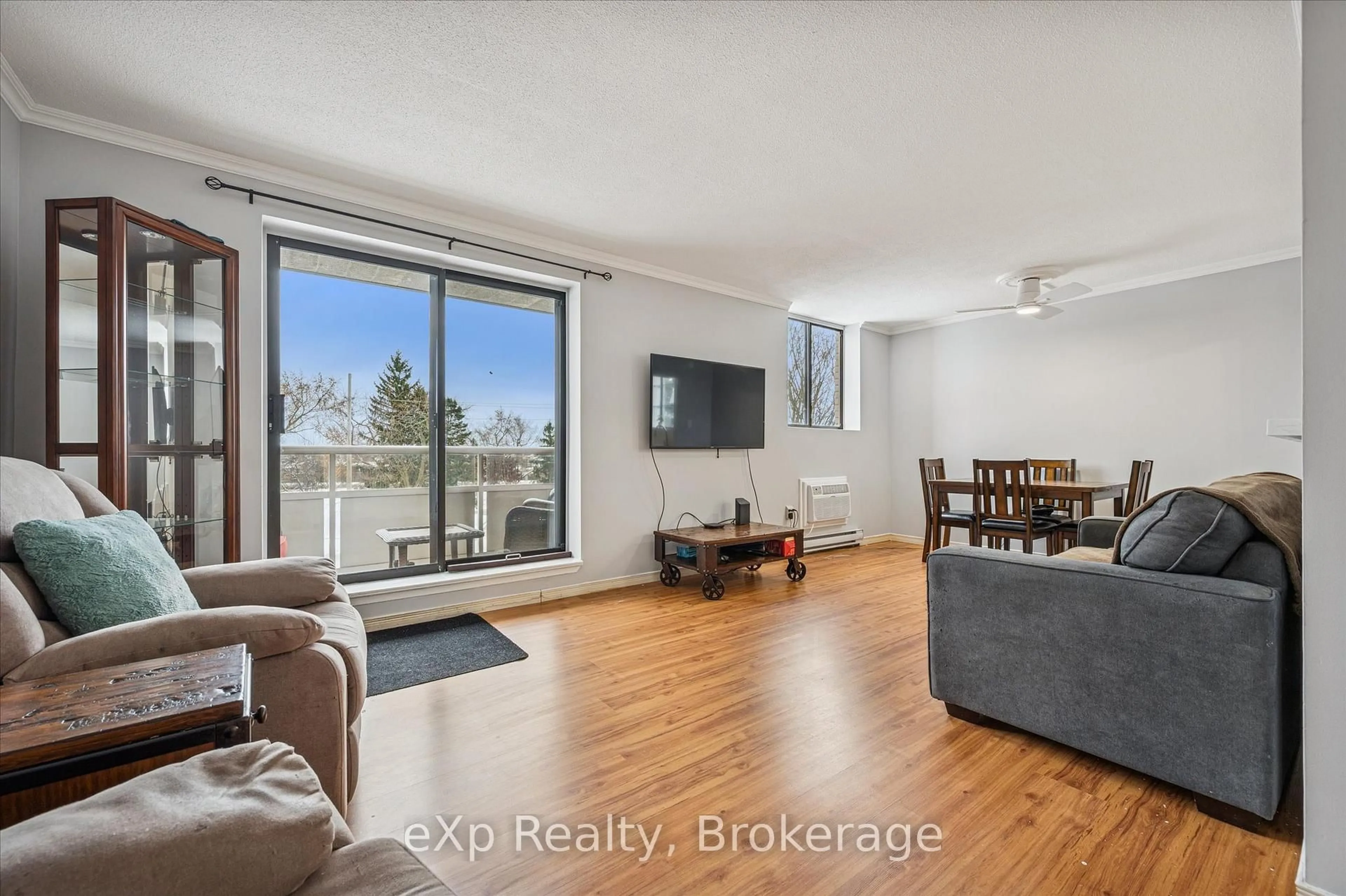 Living room with furniture, unknown for 93 Westwood Rd #301, Guelph Ontario N1H 7J7