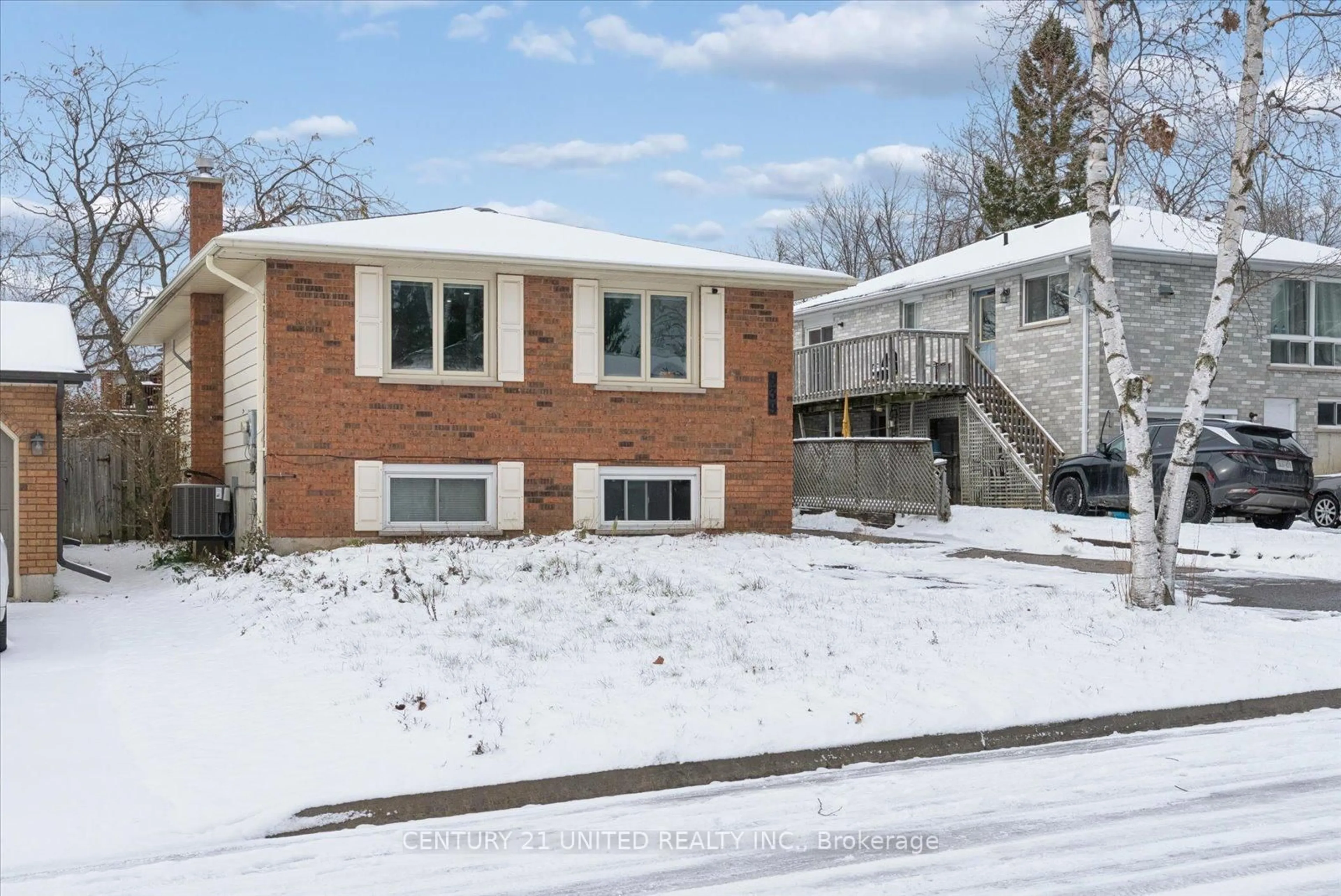 Home with brick exterior material, street for 939 Dainard Dr, Peterborough Ontario K9K 2A7