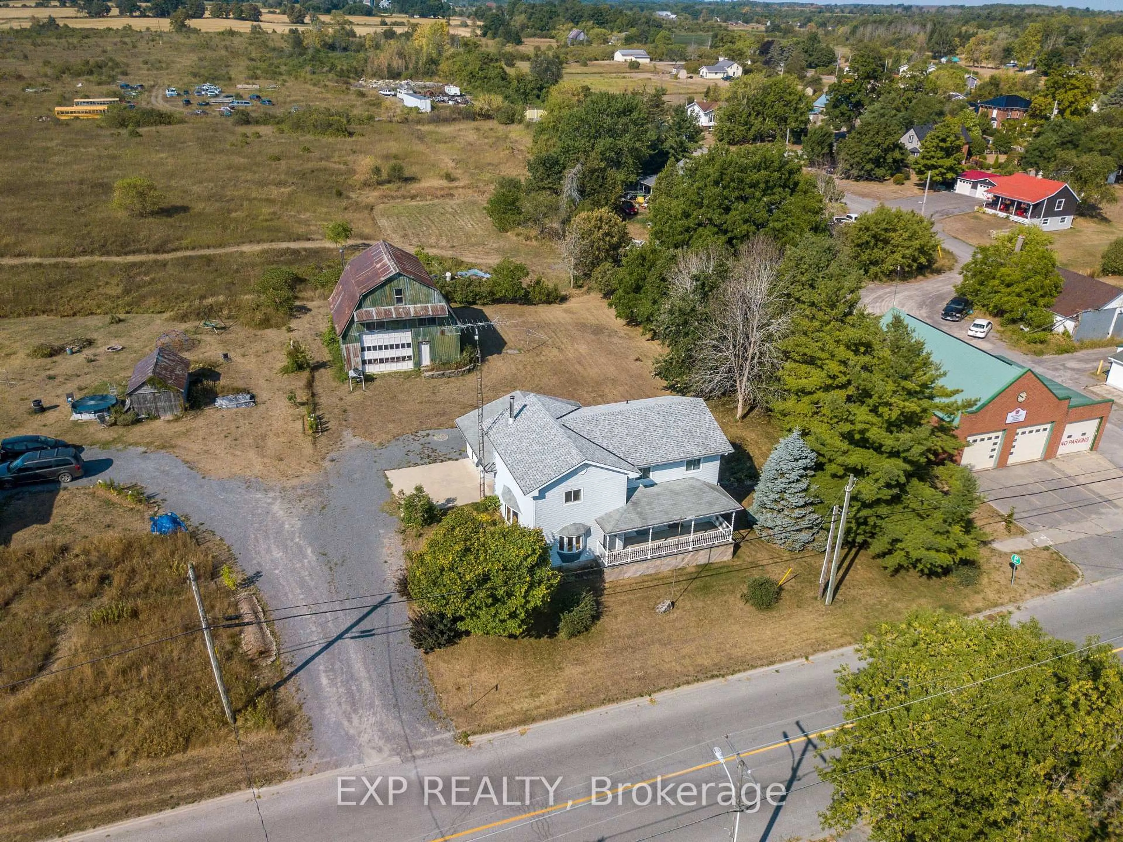 A pic from outside/outdoor area/front of a property/back of a property/a pic from drone, street for 3090 County Rd 10 Rd, Prince Edward County Ontario K0K 2P0