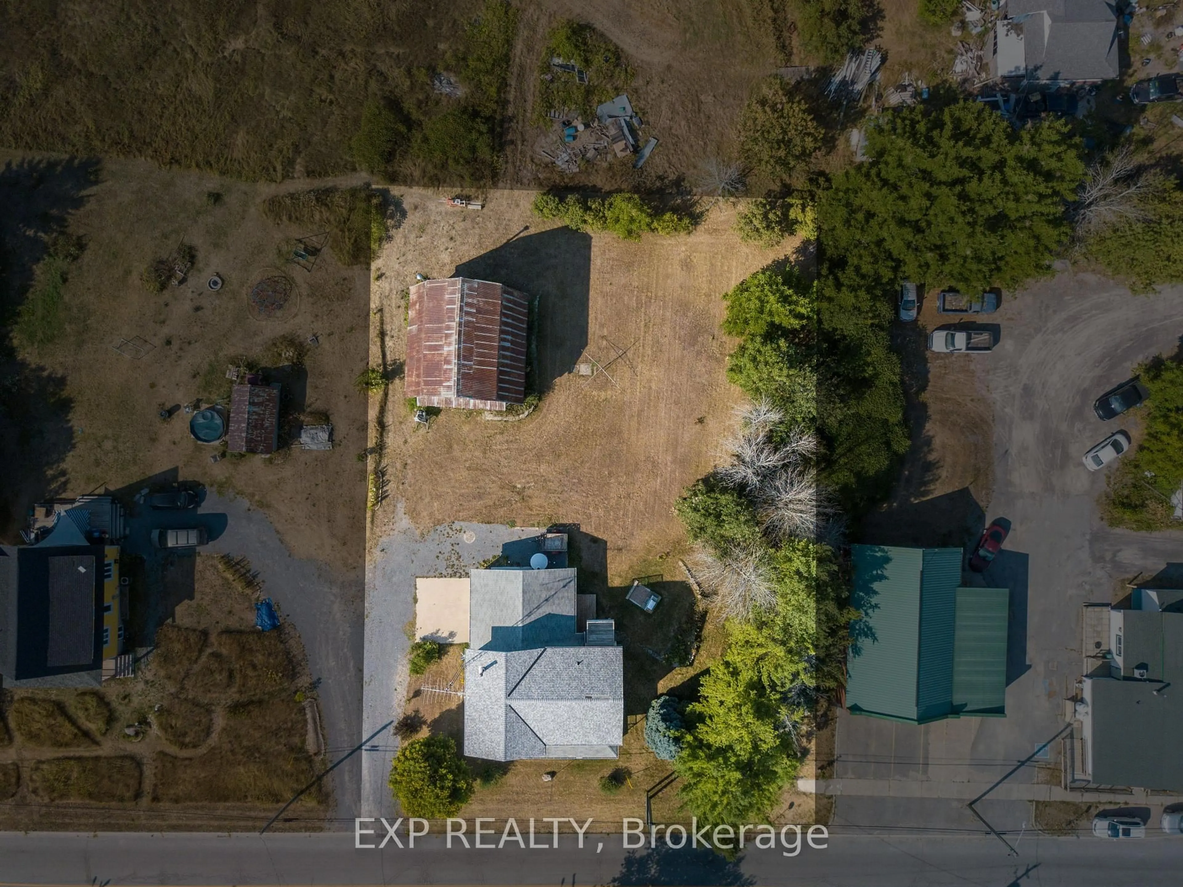 A pic from outside/outdoor area/front of a property/back of a property/a pic from drone, street for 3090 County Rd 10 Rd, Prince Edward County Ontario K0K 2P0