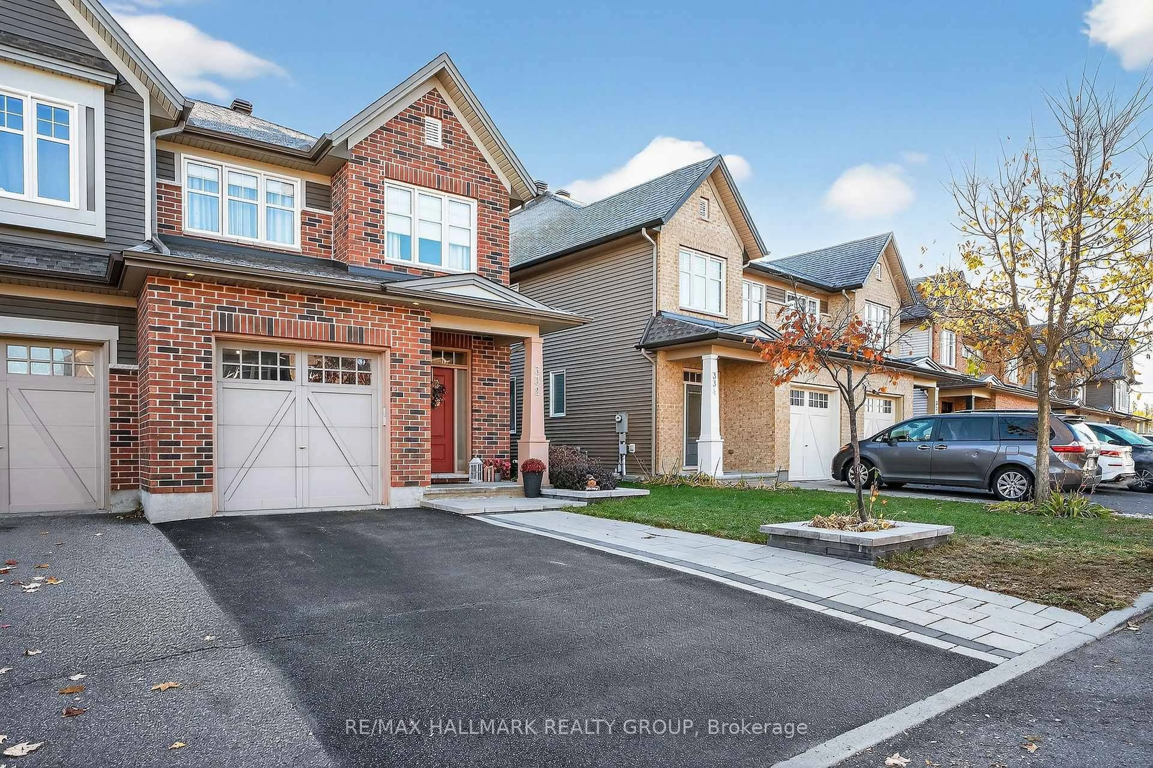Home with brick exterior material, street for 332 Gracewood Cres, Ottawa Ontario K1T 0J7