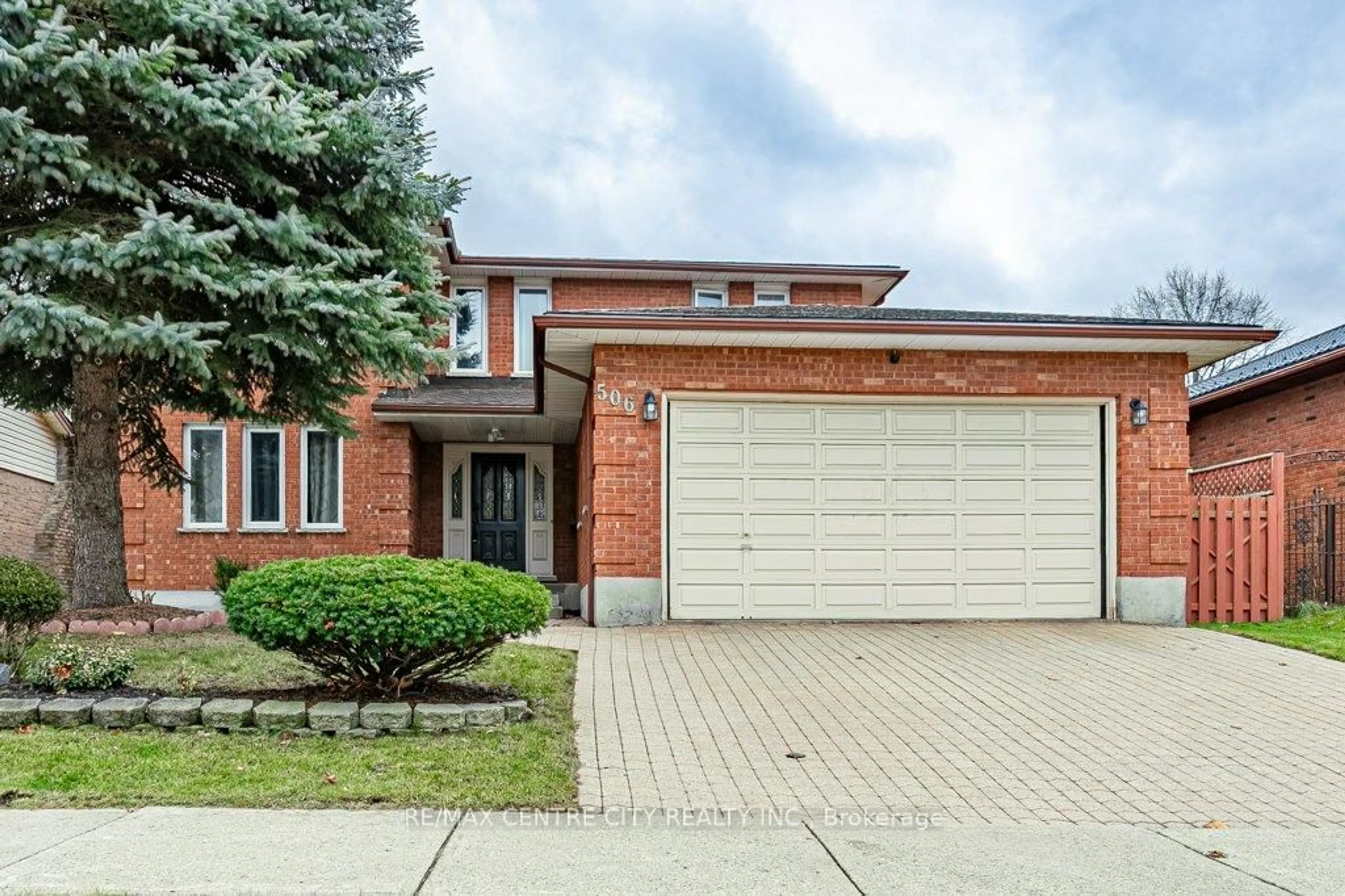 Home with brick exterior material, street for 506 Eaton Park Dr, London South Ontario N6J 4J9