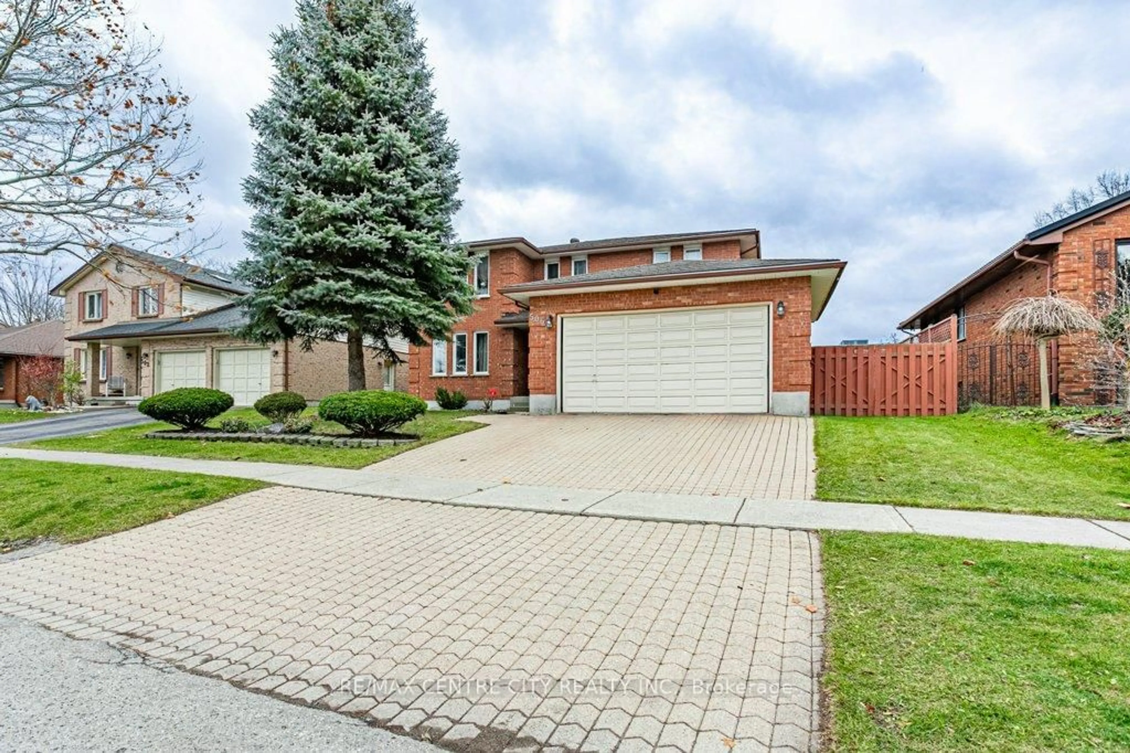 Home with brick exterior material, street for 506 Eaton Park Dr, London South Ontario N6J 4J9