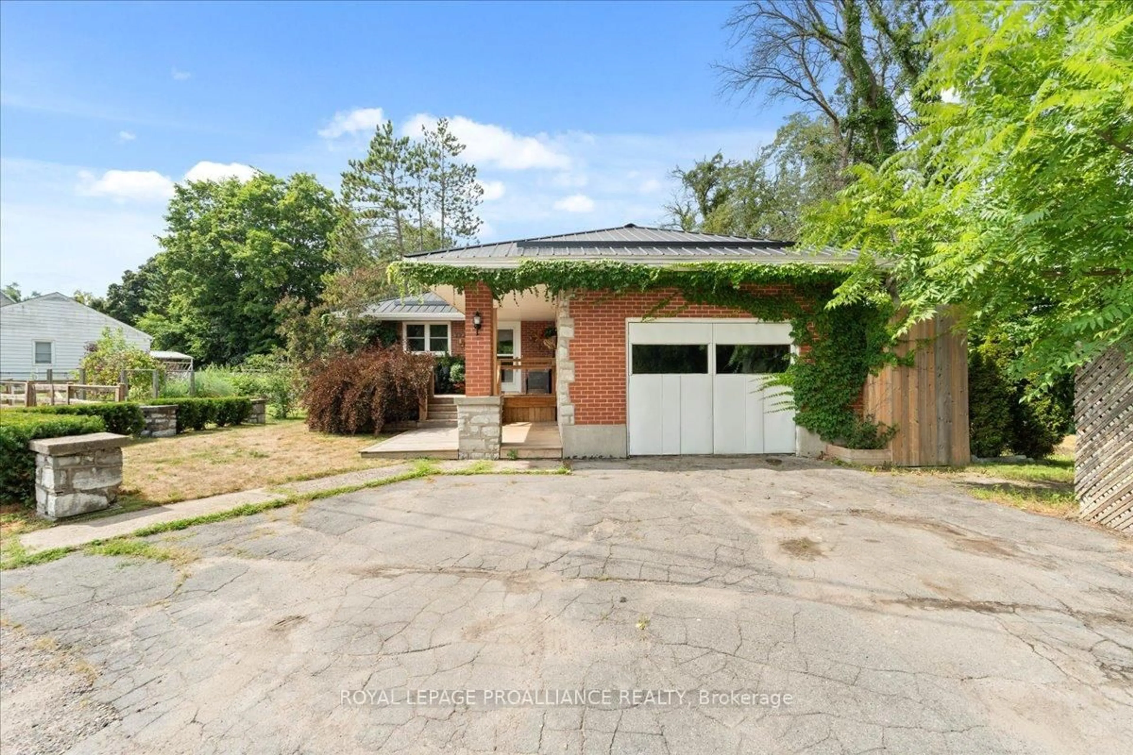 Home with brick exterior material, street for 122 Spring St, Tweed Ontario K0K 3J0