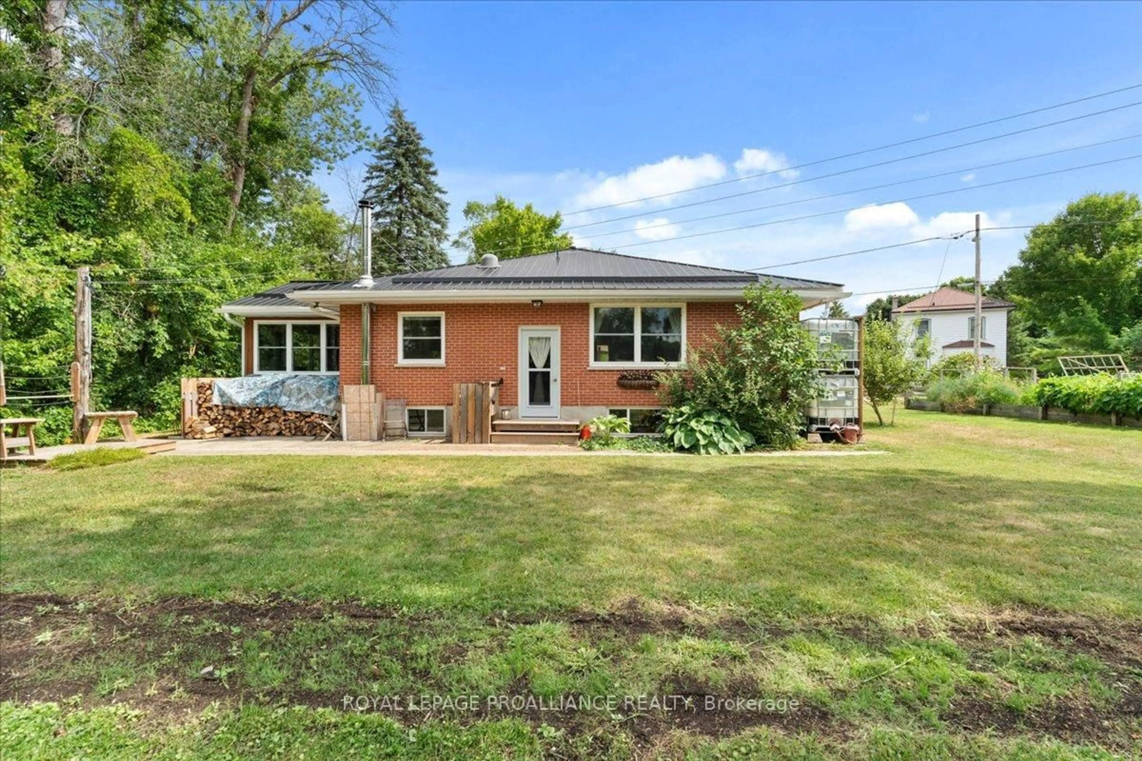 Home with brick exterior material, street for 122 Spring St, Tweed Ontario K0K 3J0