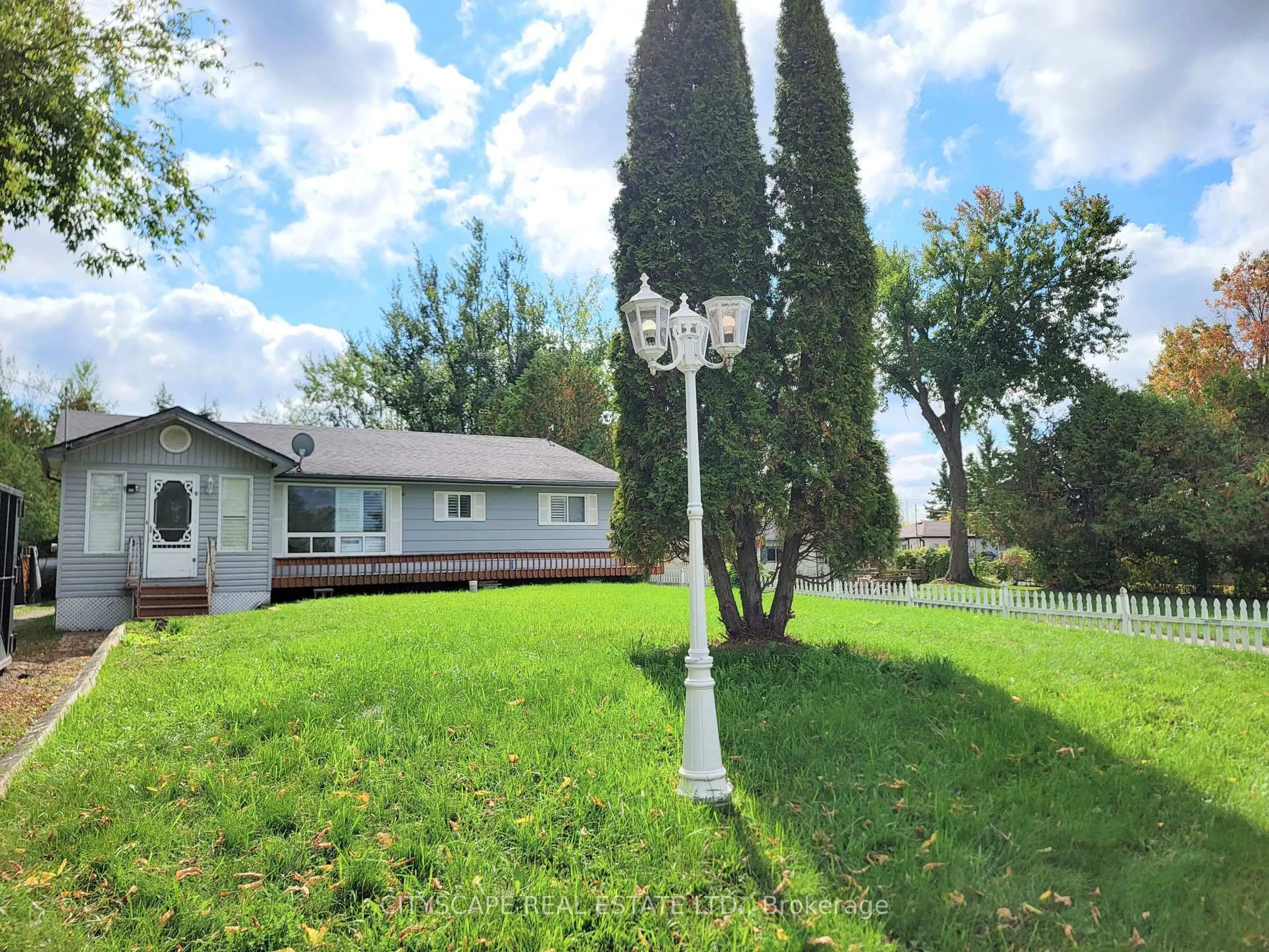 A pic from outside/outdoor area/front of a property/back of a property/a pic from drone, street for 34 Robinson Ave, Kawartha Lakes Ontario K0M 2B0