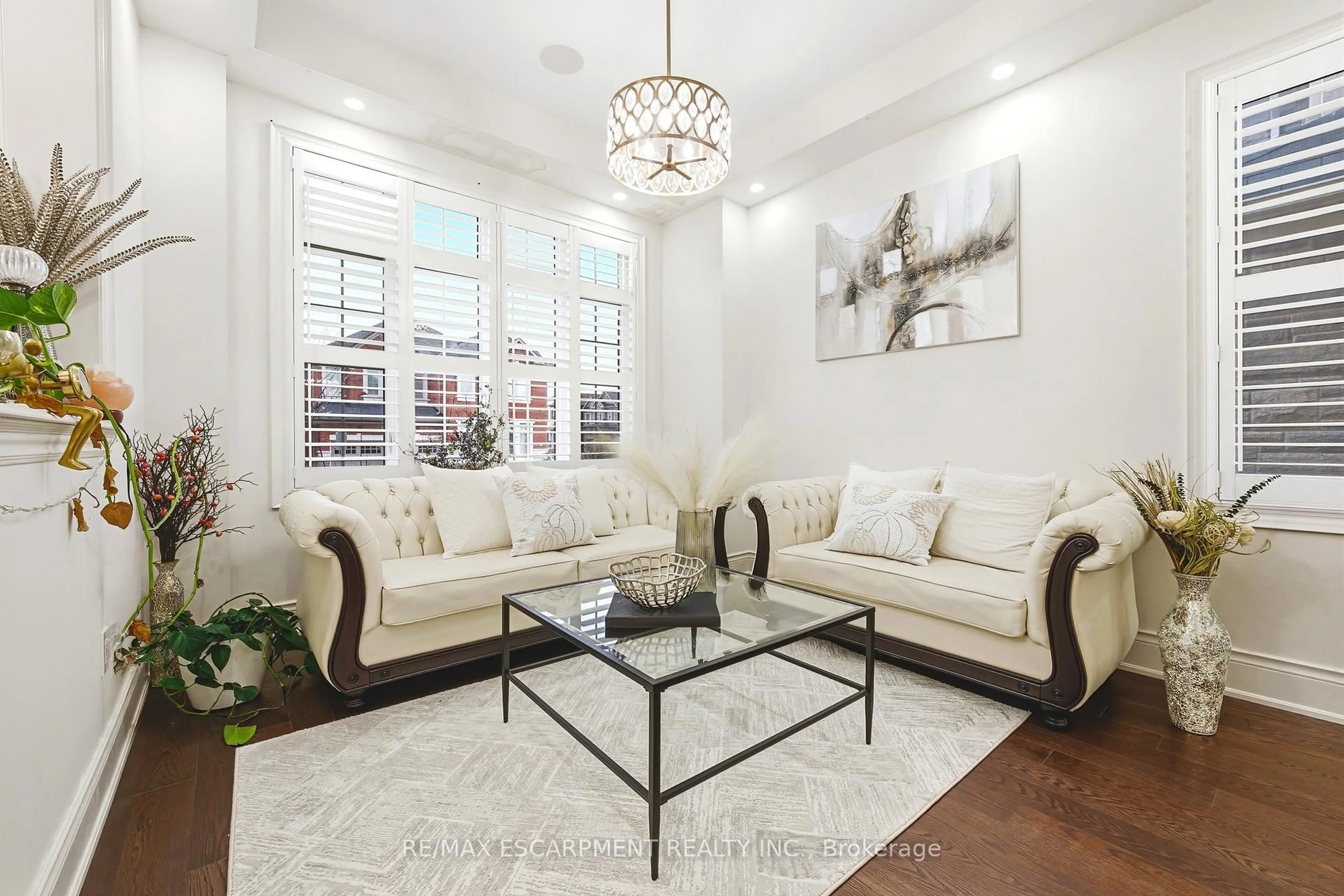 Living room with furniture, unknown for 60 Golden Hawk Dr, Hamilton Ontario L8B 1W9