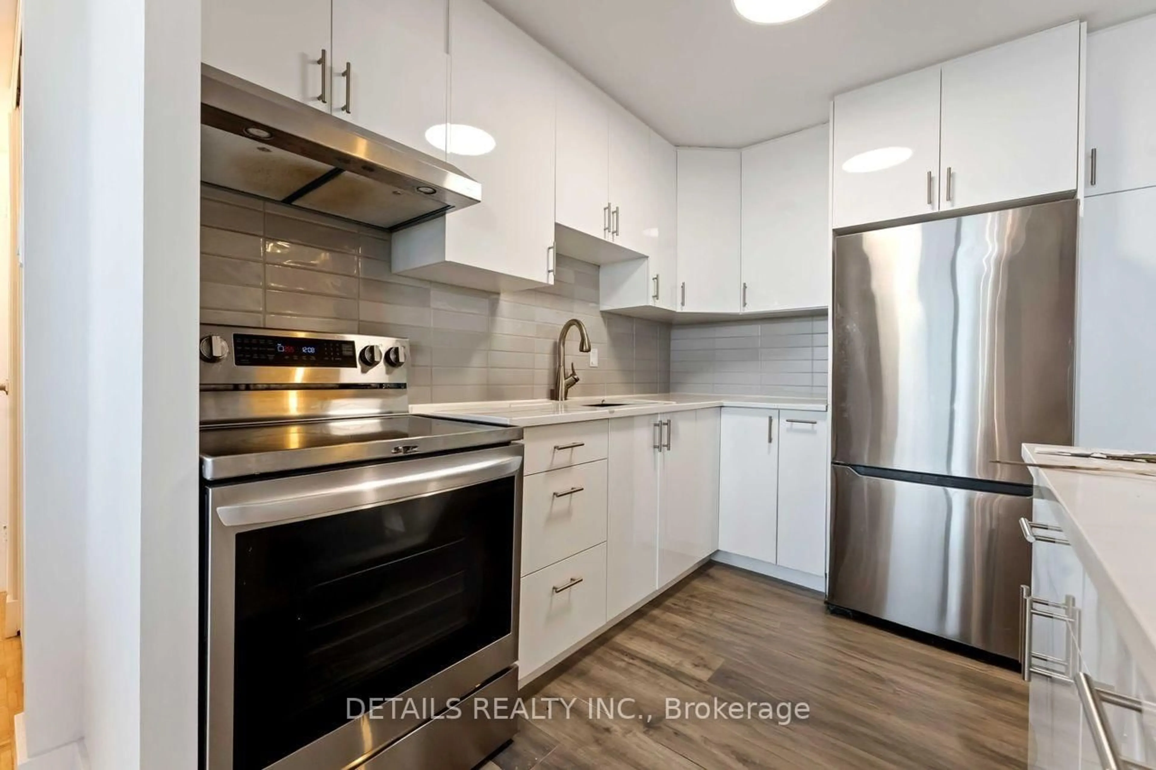 Standard kitchen, wood/laminate floor for 265 Poulin Ave #1910, Ottawa Ontario K2B 7Y8