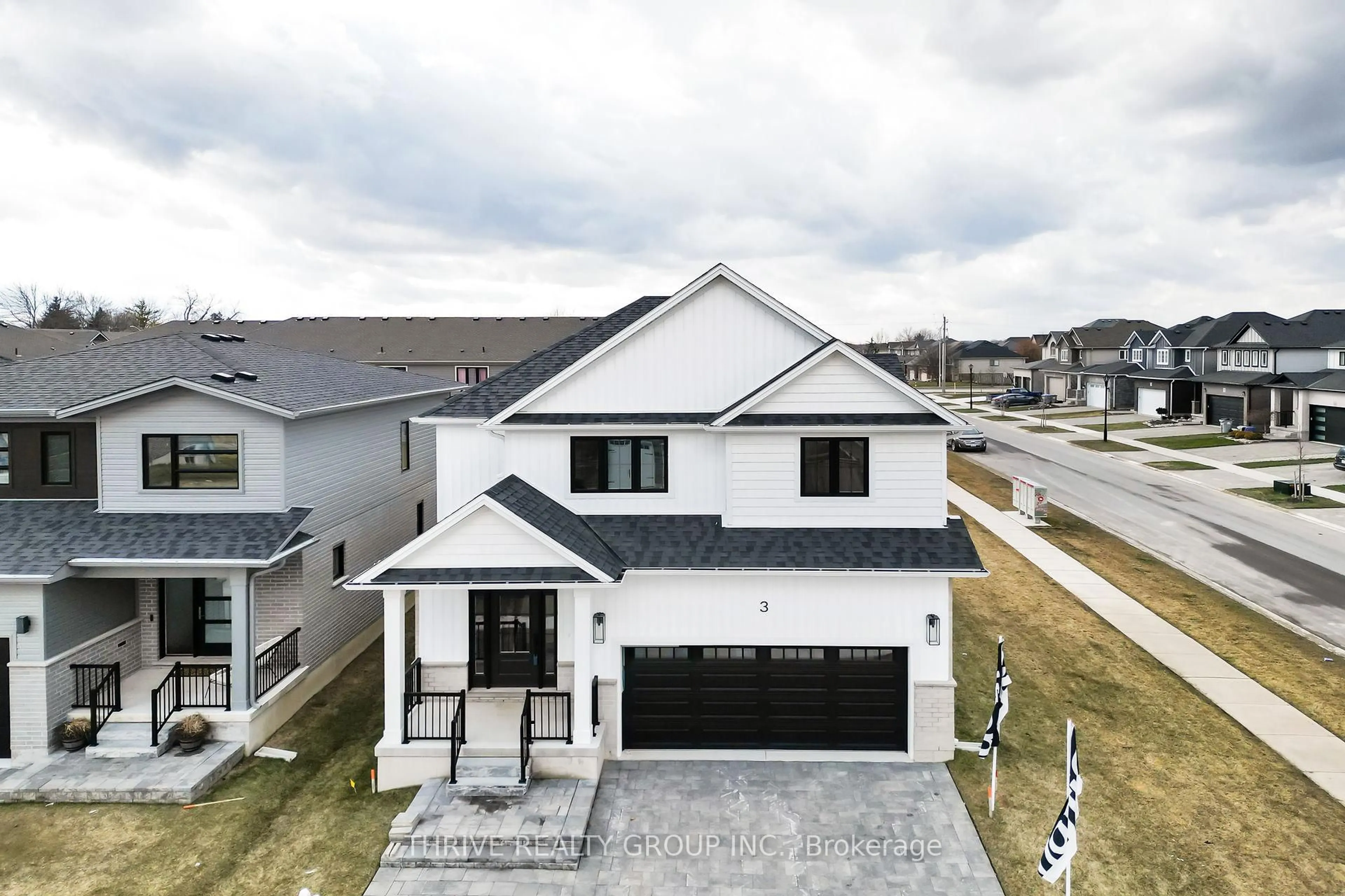 A pic from outside/outdoor area/front of a property/back of a property/a pic from drone, street for 3 Basil Cres, Middlesex Centre Ontario N0M 2A0