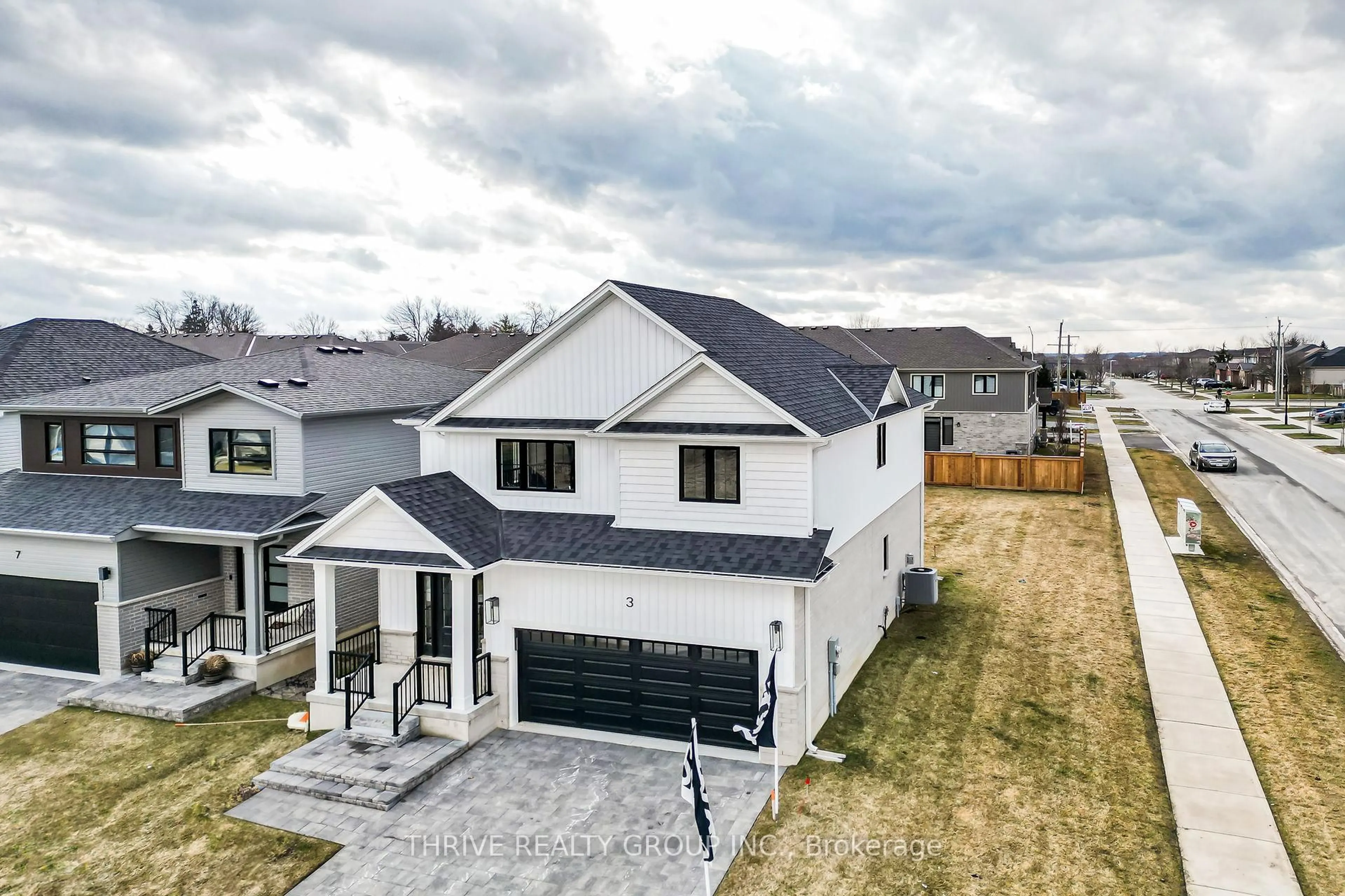 A pic from outside/outdoor area/front of a property/back of a property/a pic from drone, street for 3 Basil Cres, Middlesex Centre Ontario N0M 2A0