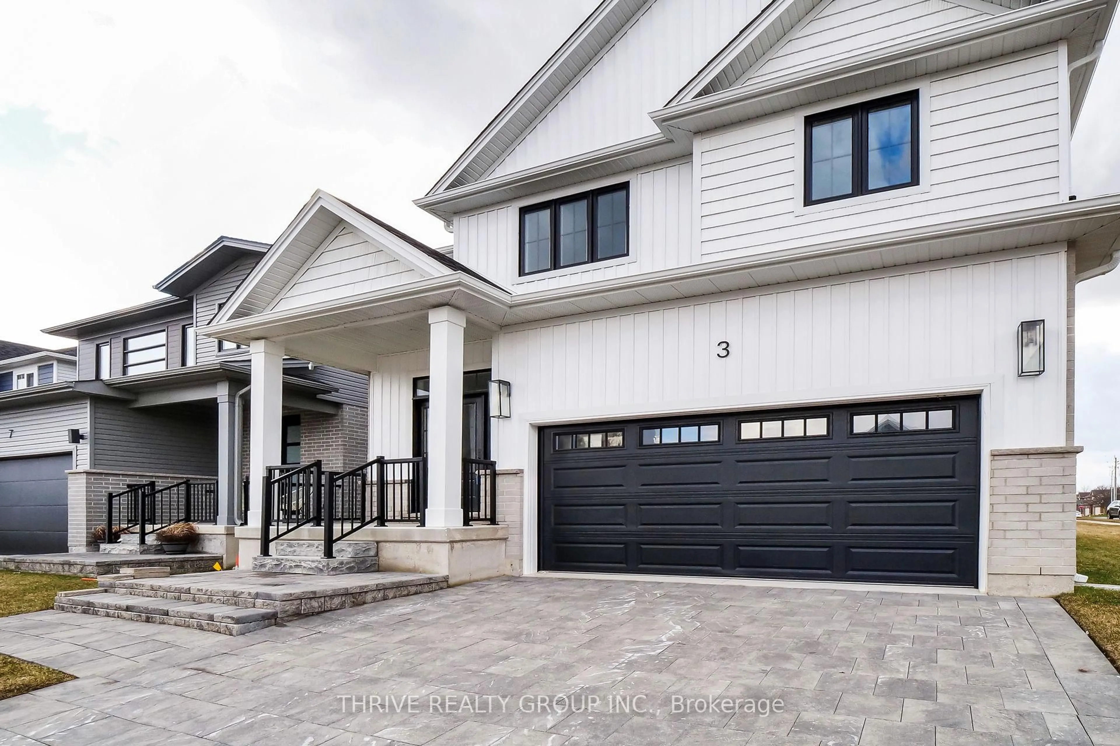 Home with vinyl exterior material, street for 3 Basil Cres, Middlesex Centre Ontario N0M 2A0