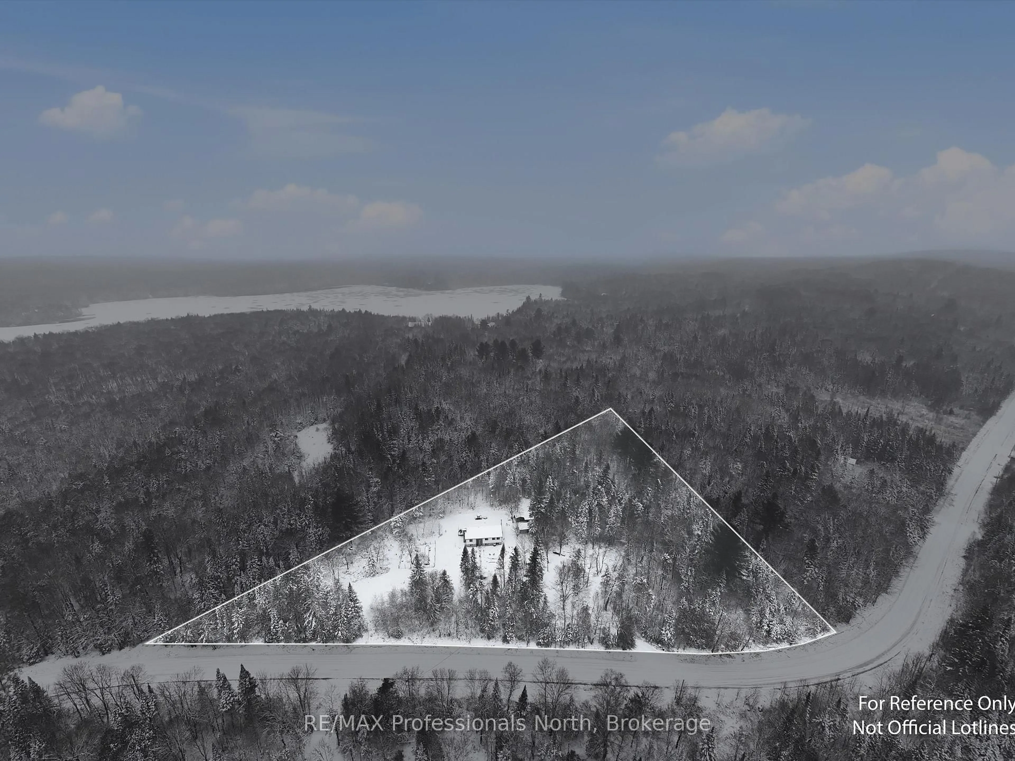 A pic from outside/outdoor area/front of a property/back of a property/a pic from drone, forest/trees view for 966 Boundary Rd, Huntsville Ontario P0A 1R0