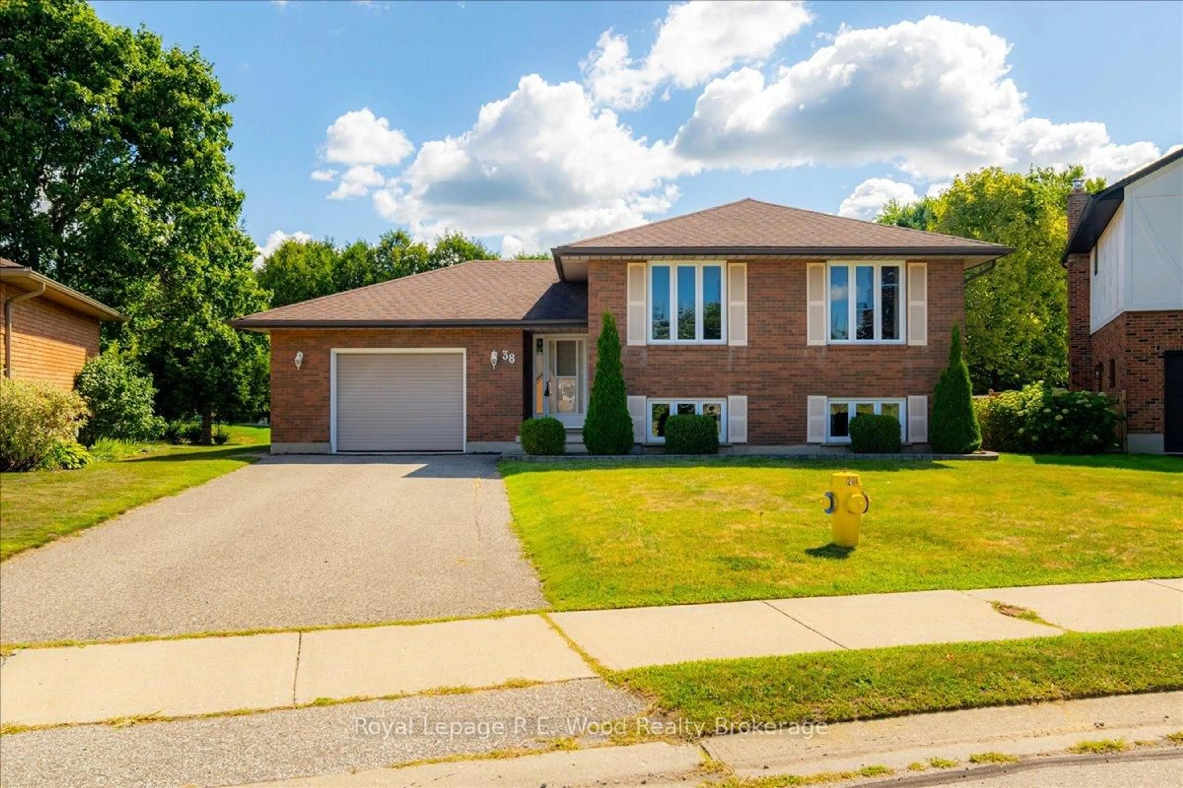 Home with brick exterior material, street for 38 Denrich Ave, Tillsonburg Ontario N4G 4W1