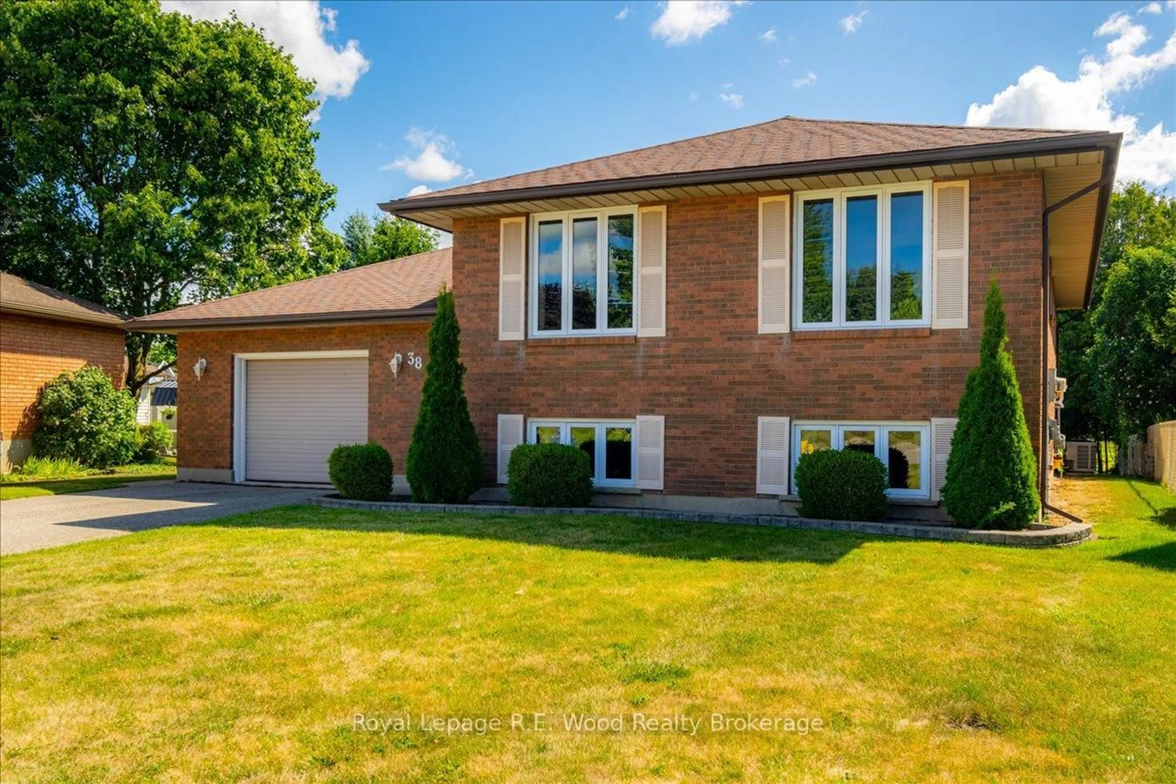 Home with brick exterior material, street for 38 Denrich Ave, Tillsonburg Ontario N4G 4W1