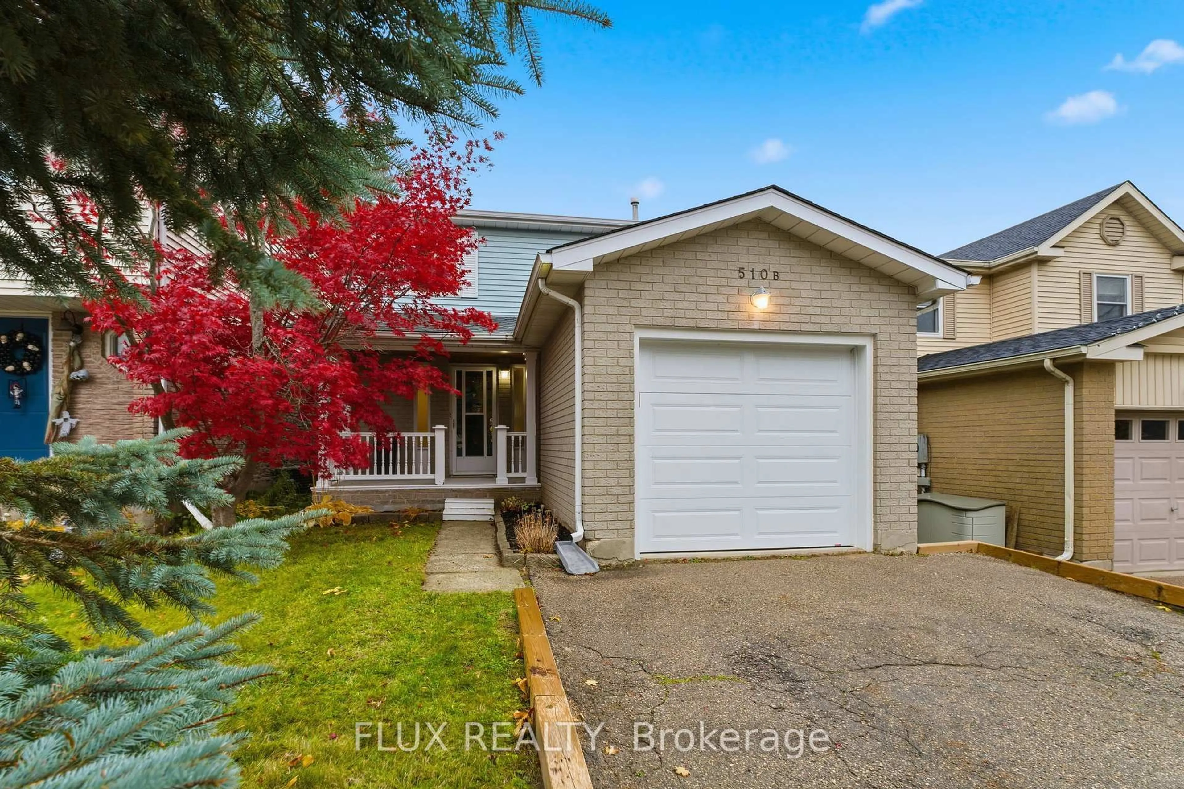 Home with vinyl exterior material, street for 510 Rosemeadow Cres #B, Waterloo Ontario N2T 2A5