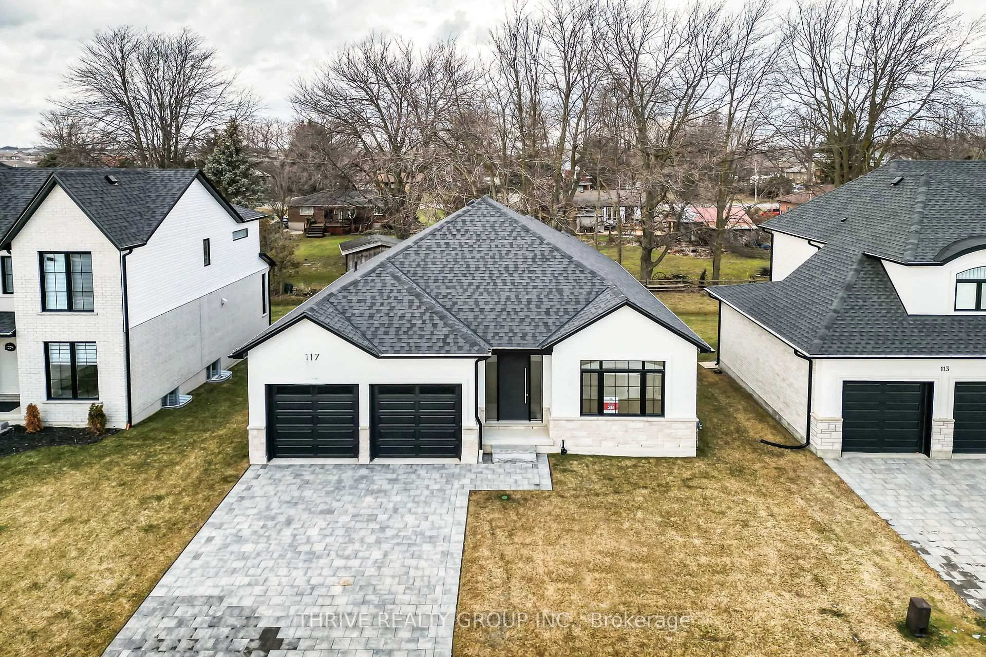 A pic from outside/outdoor area/front of a property/back of a property/a pic from drone, street for 117 ASPEN Circ, Thames Centre Ontario N0M 0A4