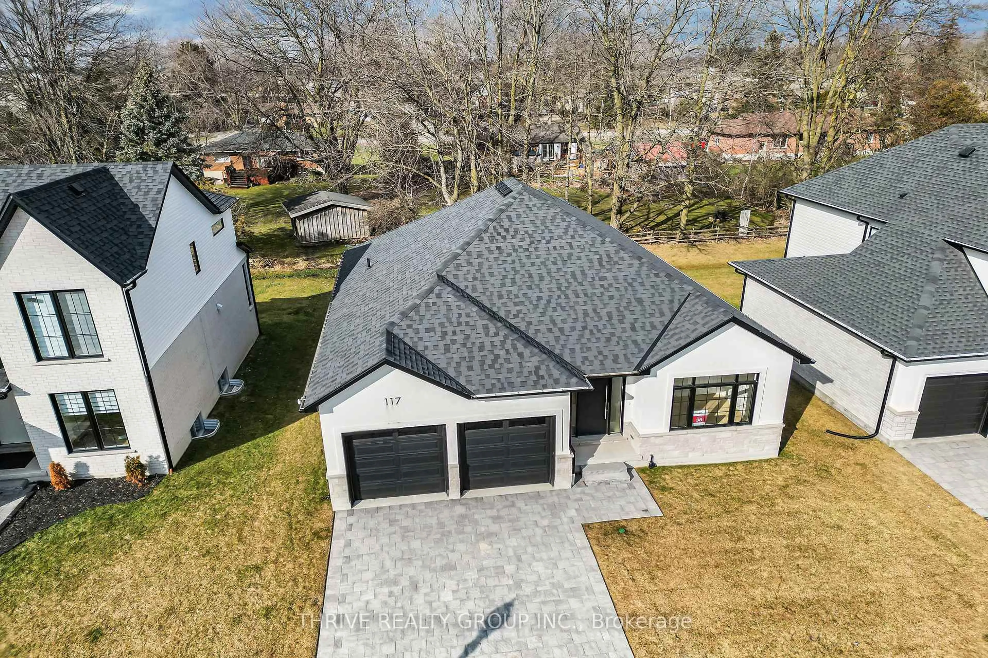 A pic from outside/outdoor area/front of a property/back of a property/a pic from drone, street for 117 ASPEN Circ, Thames Centre Ontario N0M 0A4