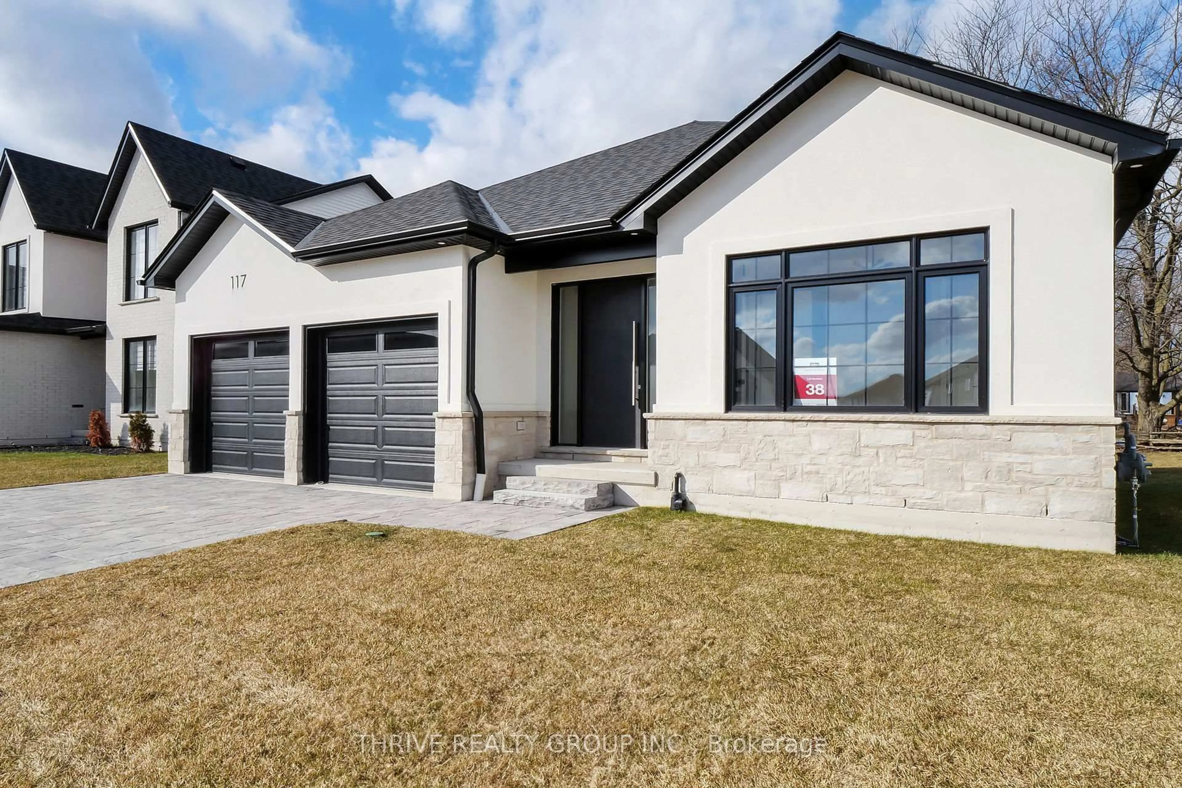 Home with brick exterior material, street for 117 ASPEN Circ, Thames Centre Ontario N0M 0A4
