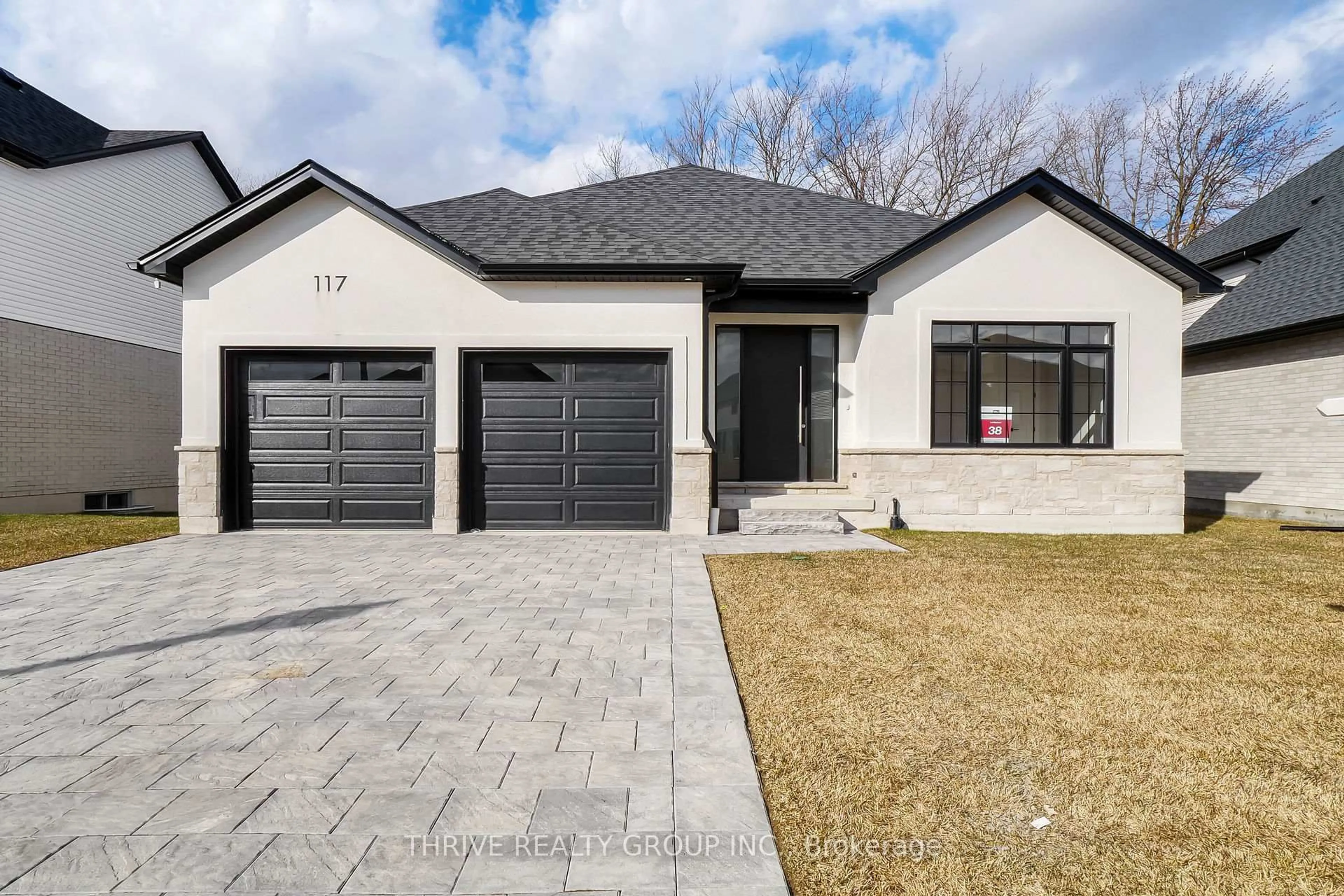 Home with brick exterior material, street for 117 ASPEN Circ, Thames Centre Ontario N0M 0A4