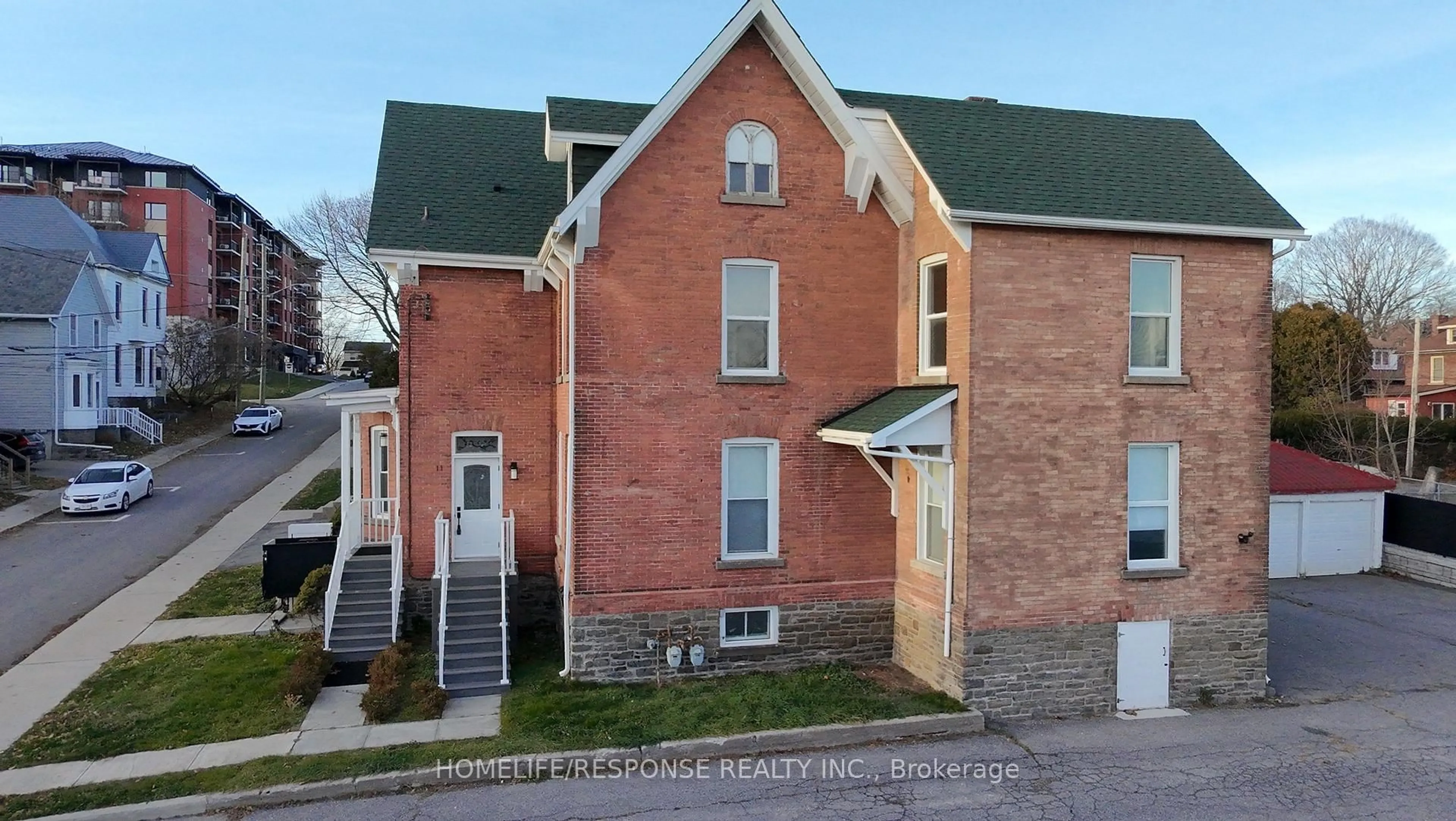Home with brick exterior material, building for 13 Garden St #11-13, Brockville Ontario K6V 2B8