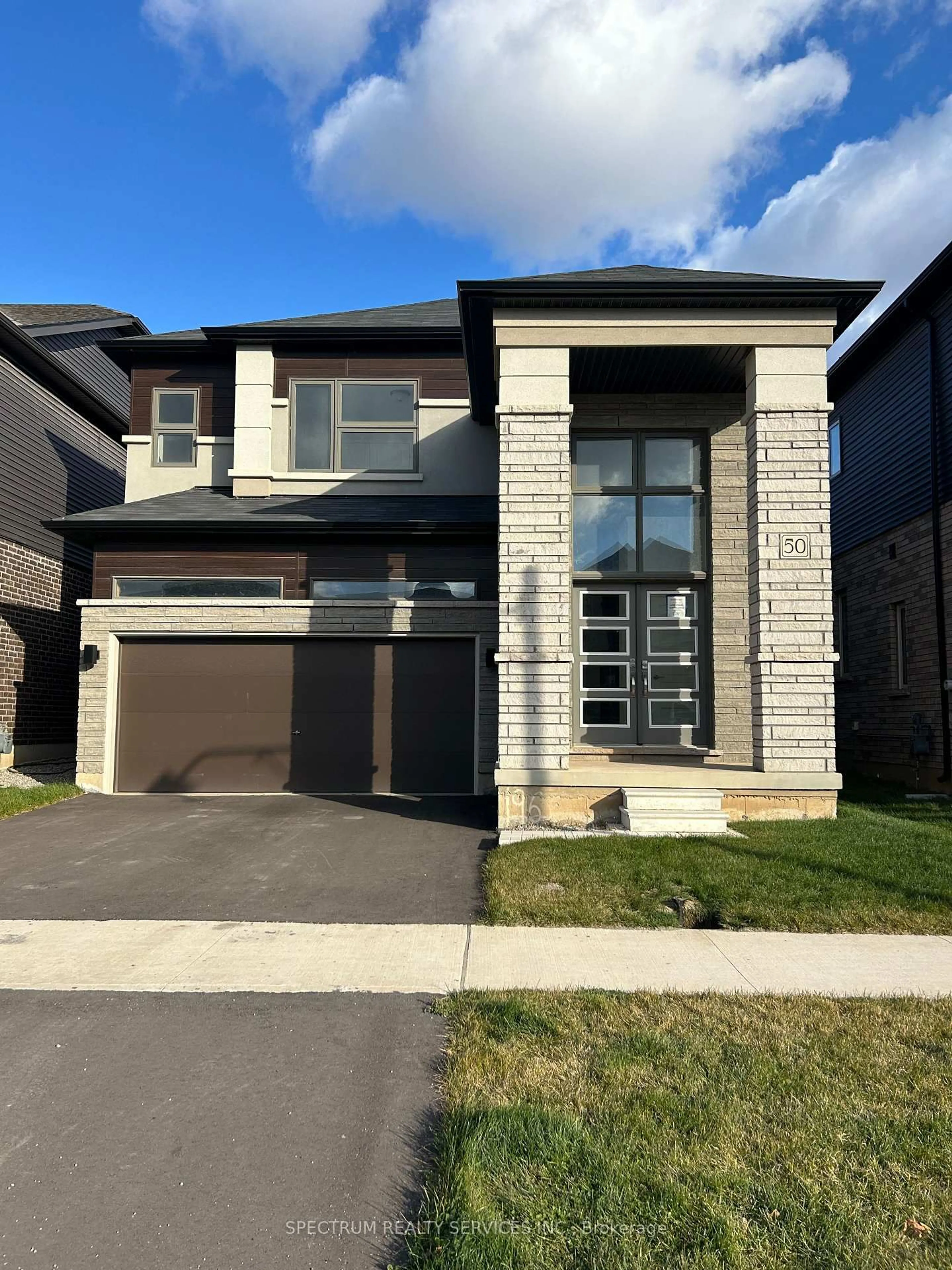 Home with brick exterior material, street for 50 Dennis Ave, Brantford Ontario N3V 0B9