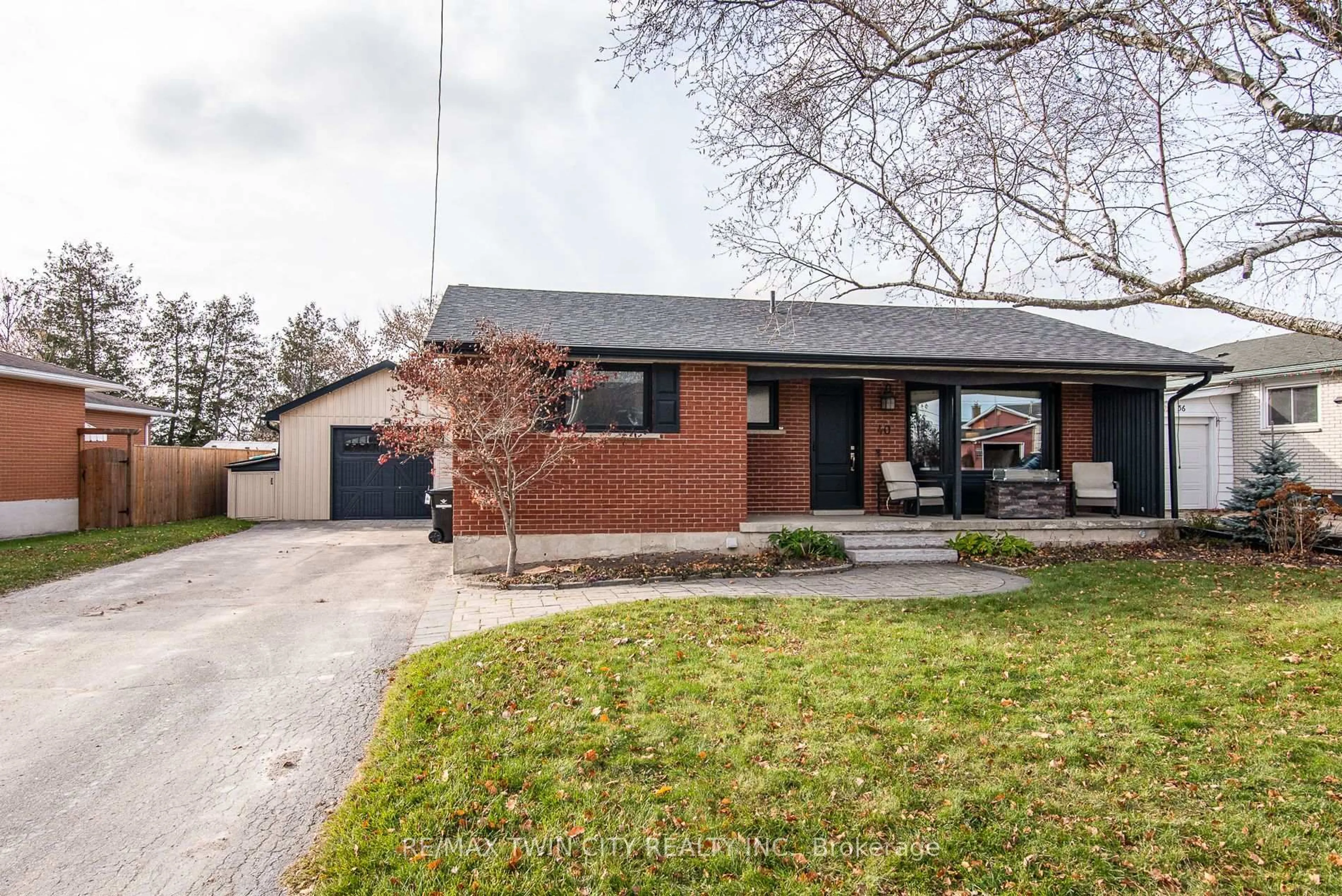 Home with brick exterior material, street for 40 Riverside Dr, Wilmot Ontario N3A 2H6