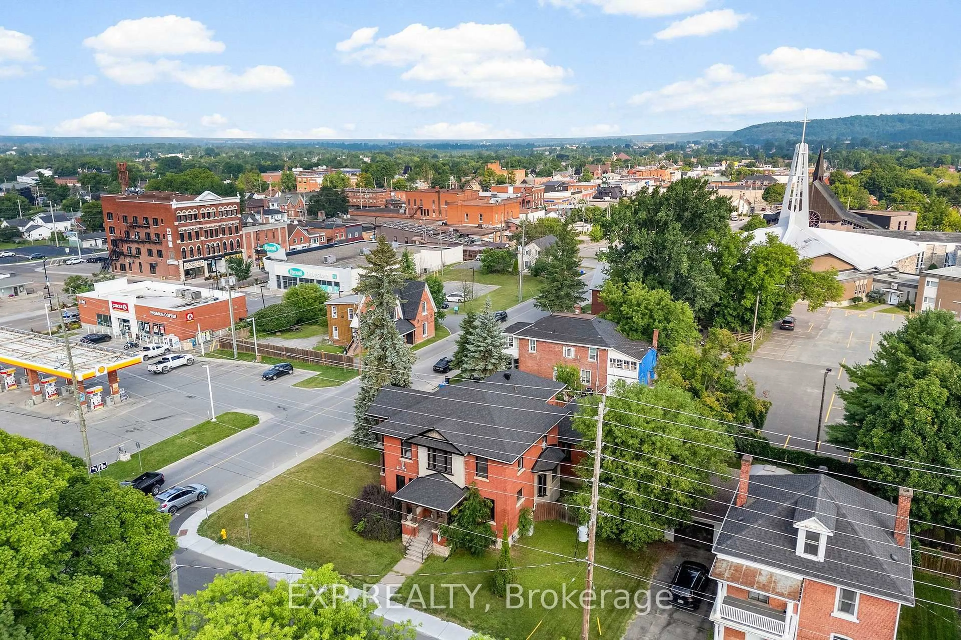 A pic from outside/outdoor area/front of a property/back of a property/a pic from drone, city buildings view from balcony for 48 Hall Ave, Renfrew Ontario K7V 2S3