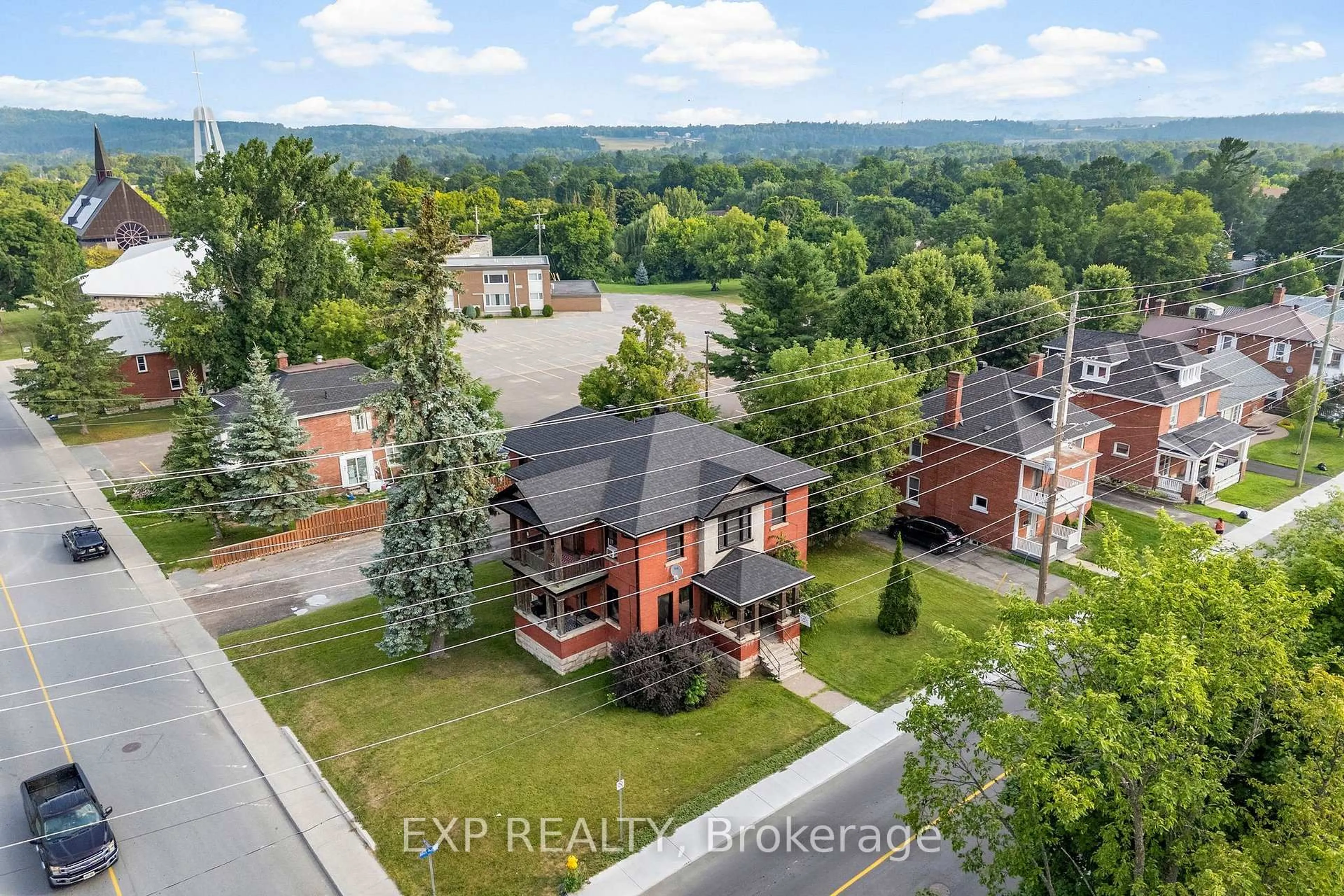 A pic from outside/outdoor area/front of a property/back of a property/a pic from drone, city buildings view from balcony for 48 Hall Ave, Renfrew Ontario K7V 2S3