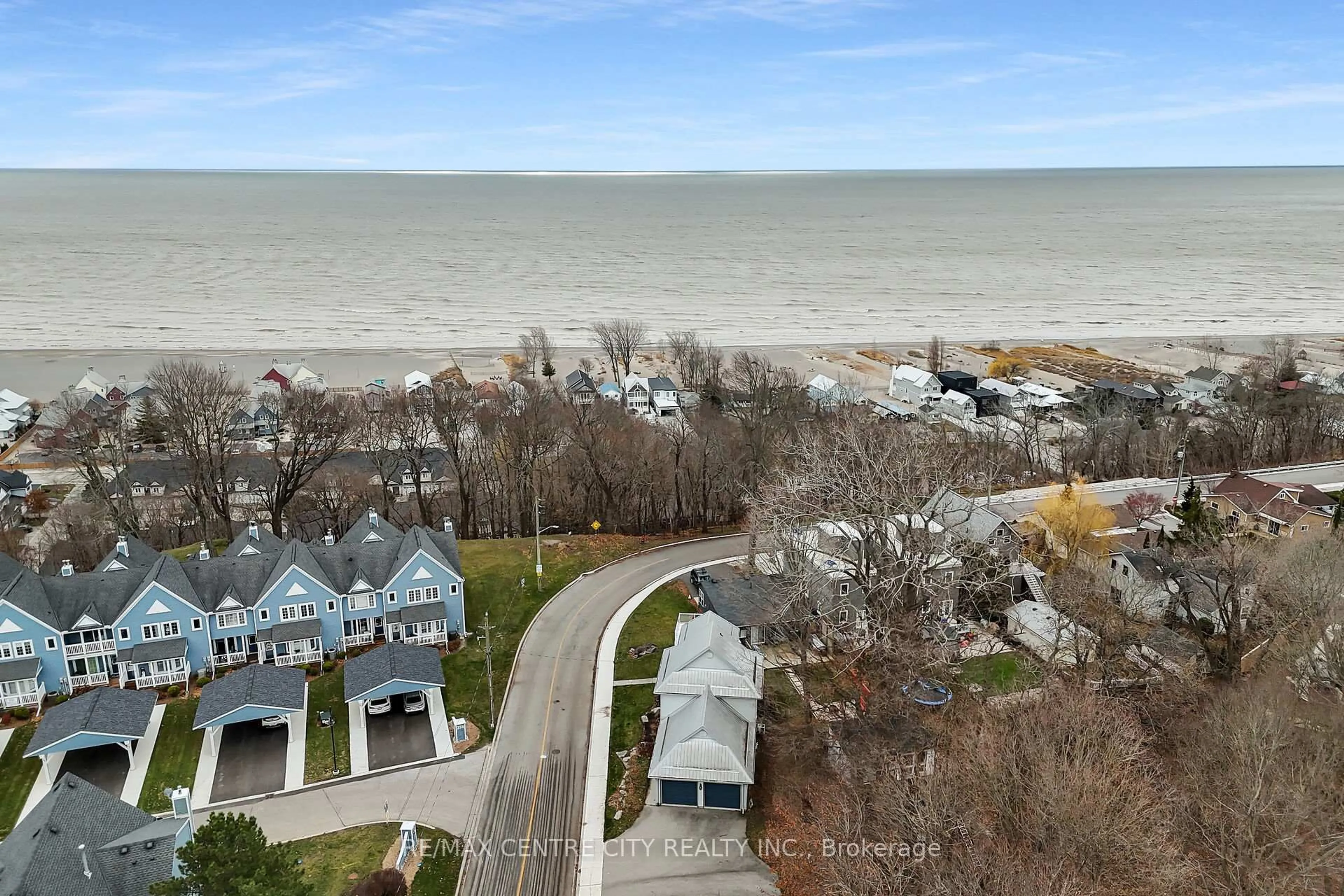 A pic from outside/outdoor area/front of a property/back of a property/a pic from drone, water/lake/river/ocean view for 379 Front St, Central Elgin Ontario N5L 1G2