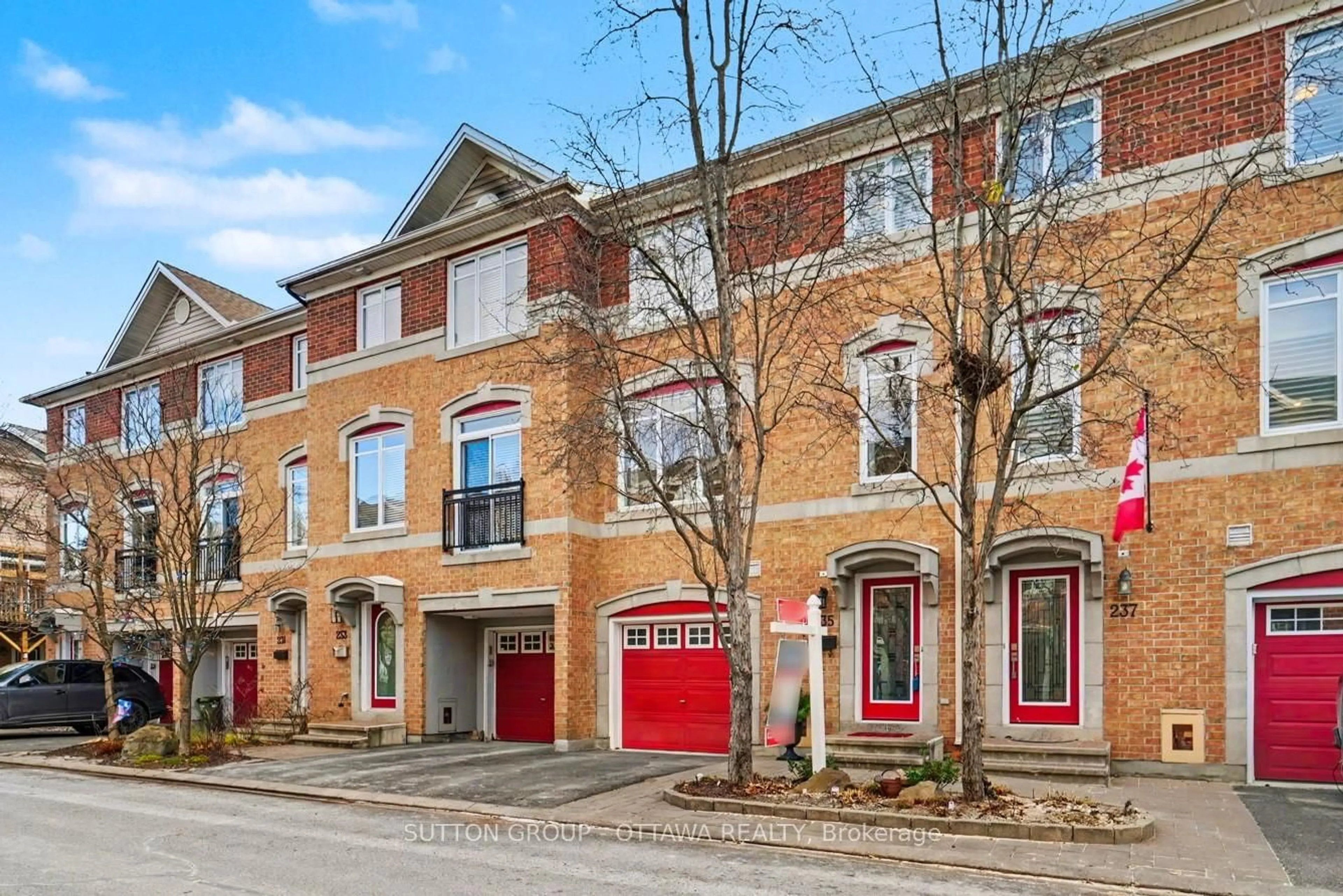 Home with brick exterior material, street for 235 West Village Private, Ottawa Ontario K1Z 1E2