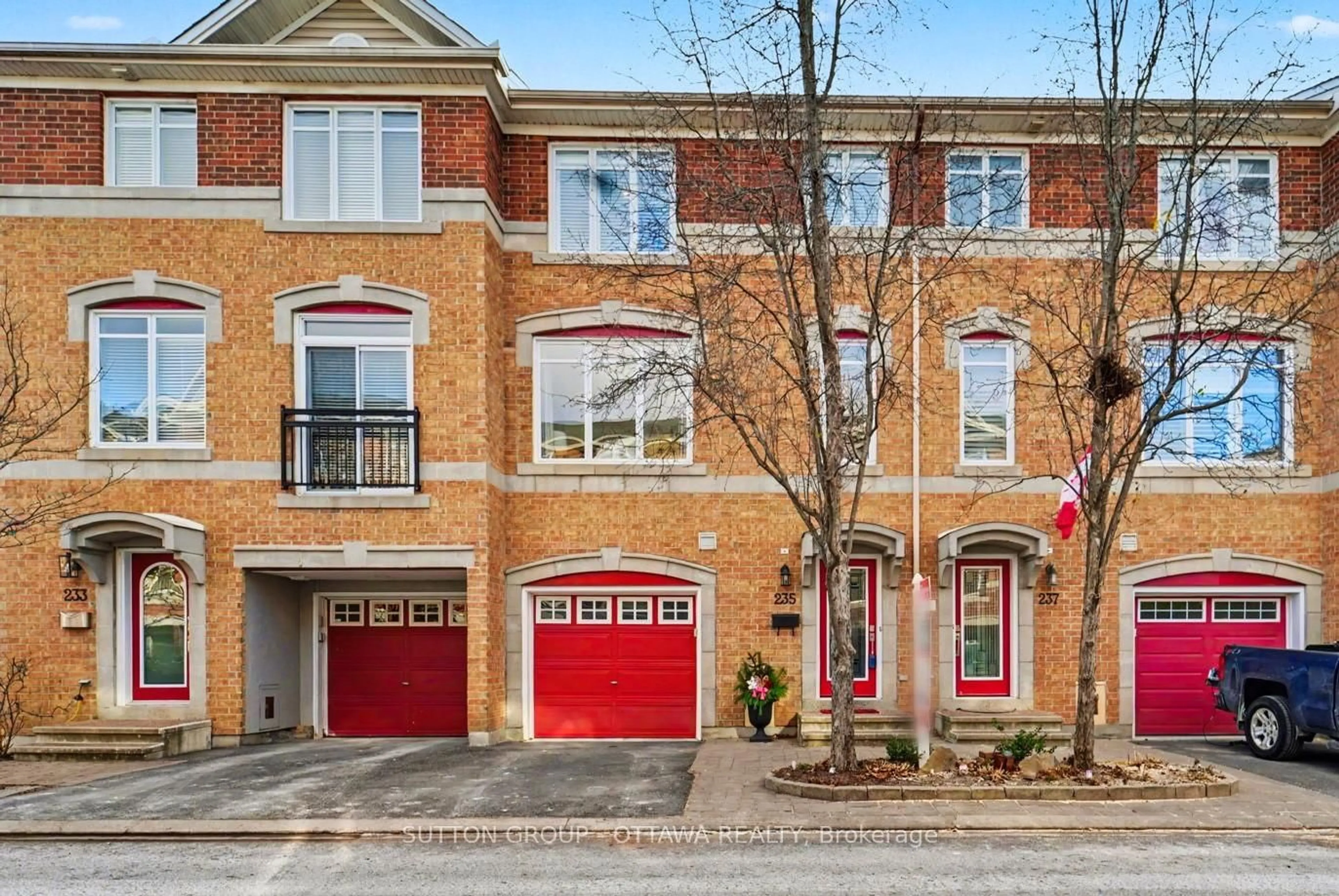 Home with brick exterior material, street for 235 West Village Private, Ottawa Ontario K1Z 1E2