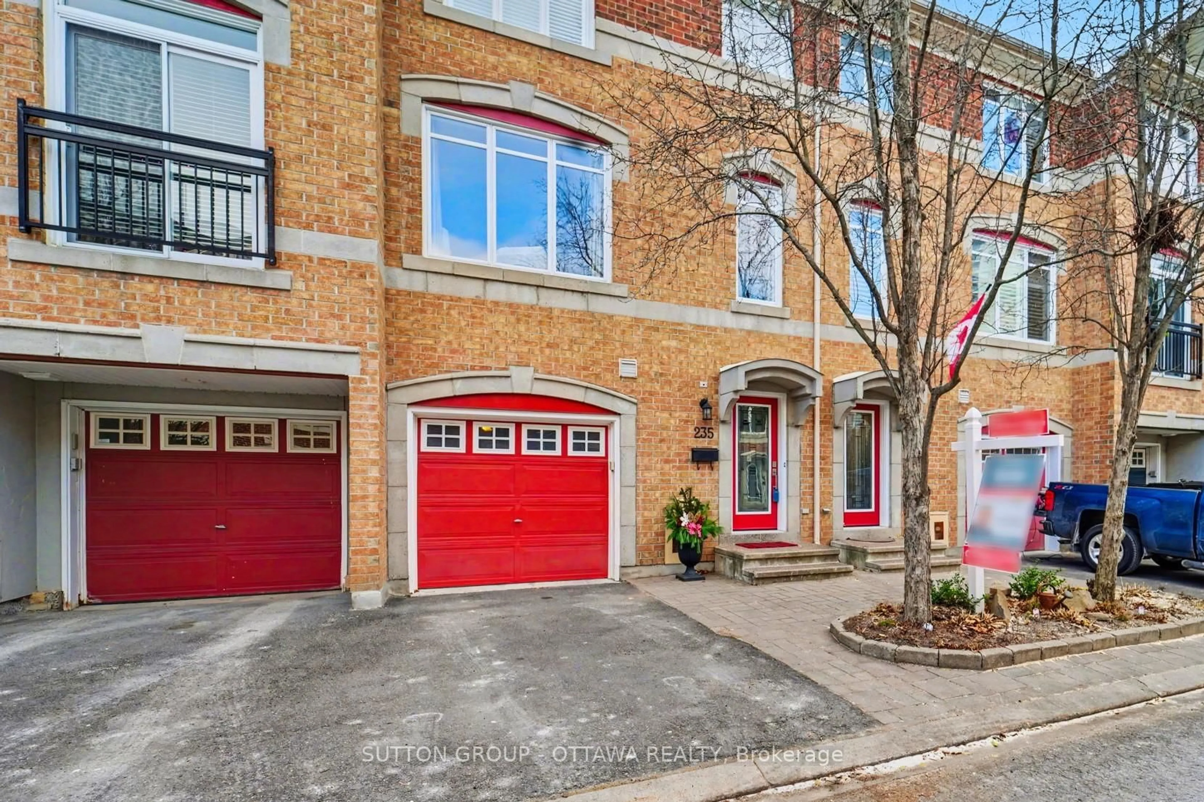 Home with brick exterior material, street for 235 West Village Private, Ottawa Ontario K1Z 1E2