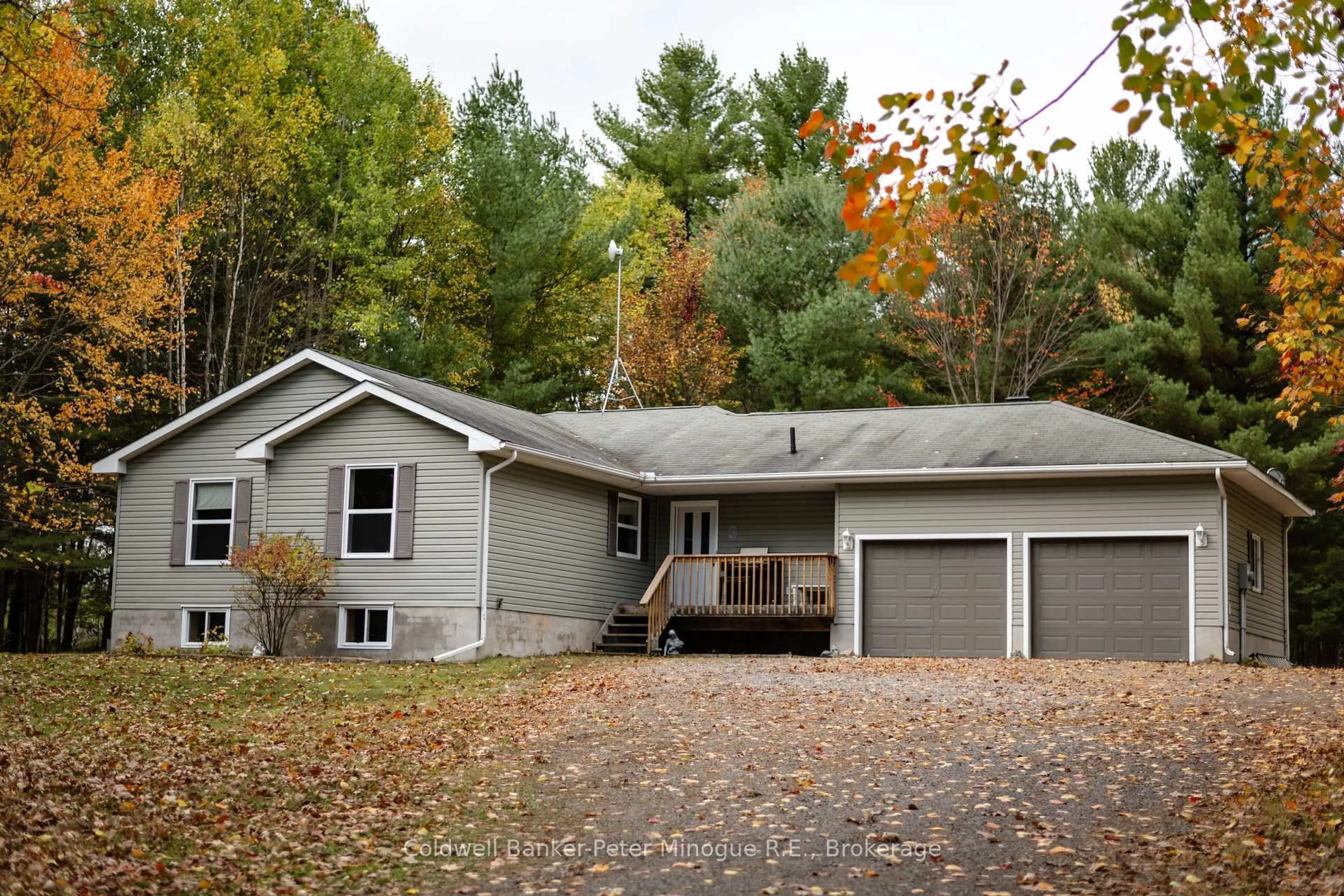 Home with vinyl exterior material, street for 567 Sunset Cove Rd, Callander Ontario P0H 1H0