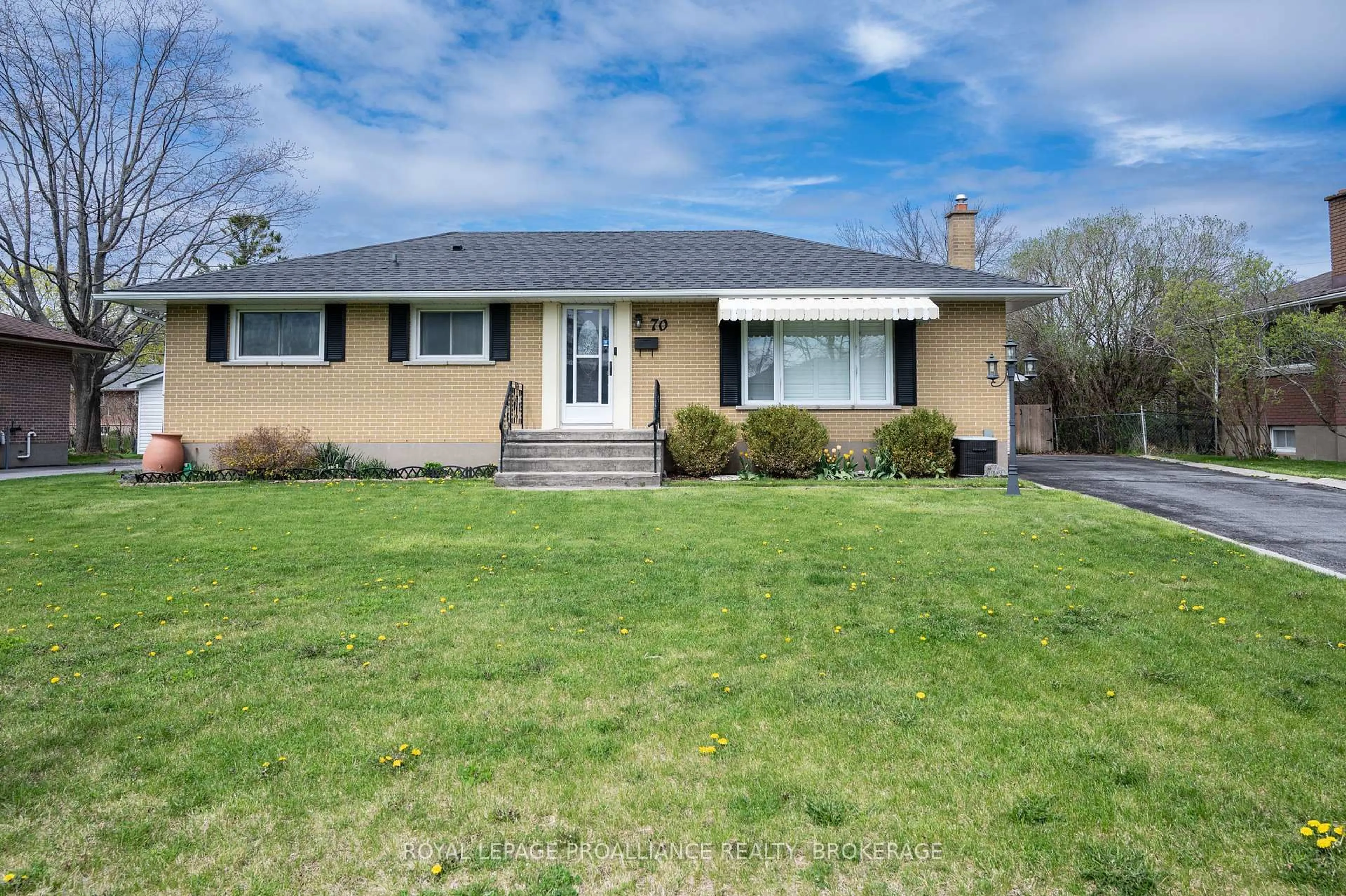 Home with vinyl exterior material, street for 70 Briscoe St, Loyalist Ontario K7N 1G1